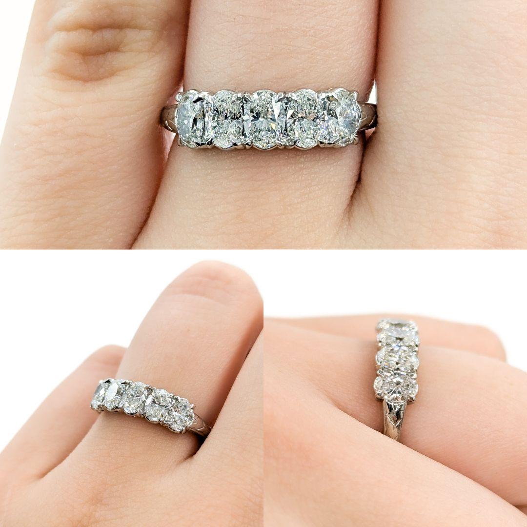 Beautiful Oval Diamond Five Stone Ring in Platinum

Introducing this exquisite 5-stone diamond ring, expertly crafted in bright platinum. The ring features 1.25 carat total weight (ctw) of diamonds set in a shared prong design. The diamonds are of