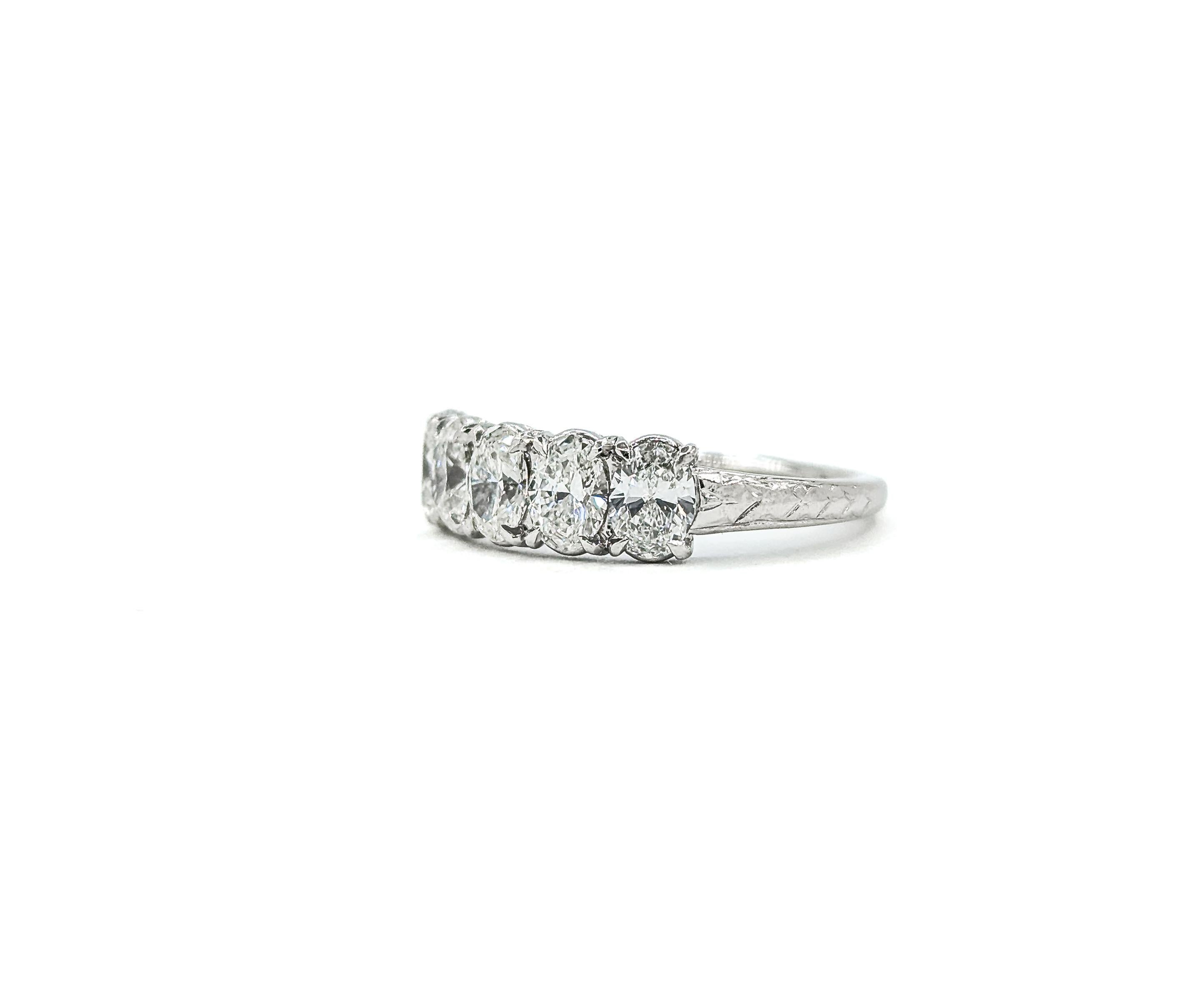 Beautiful Oval Diamond 5-Stone Ring in Platinum For Sale 4
