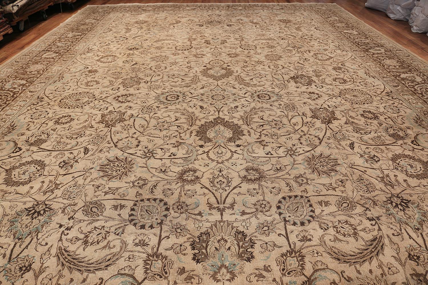 Beautifully decorative cream brown antique oversized Persian Khorassan Rug, Country of Origin / Rug Type: Persian rugs, circa 1920s. Size: 15 ft 4 in x 23 ft 8 in (4.67 m x 7.21 m)

Subtle sky blue color accents blend beautifully with the earthy