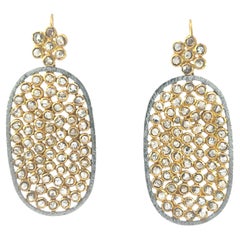 Beautiful pair of 18Kt gold and silver diamond earrings