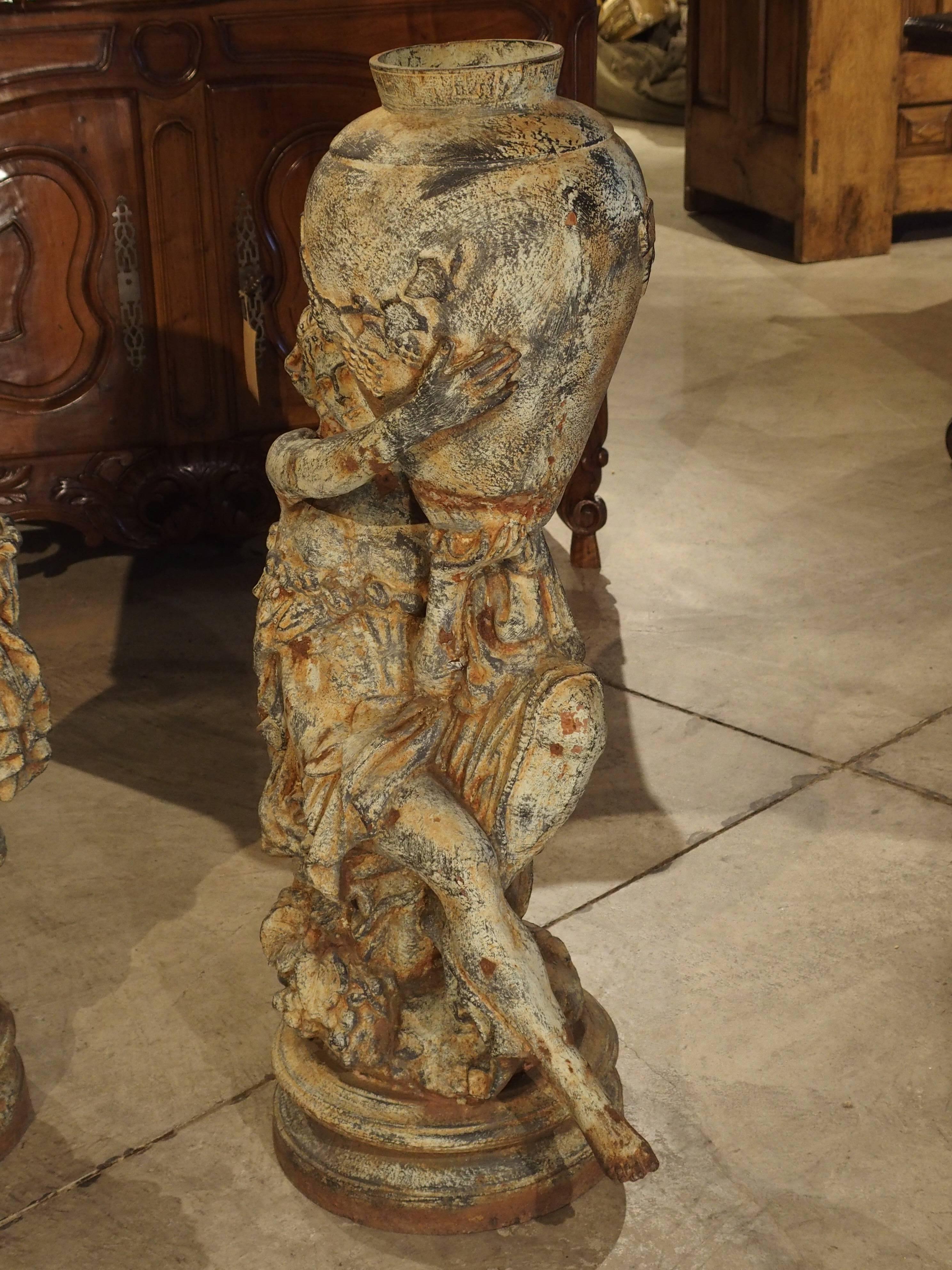 European Beautiful Pair of Antique Cast Iron Figural Garden Urns