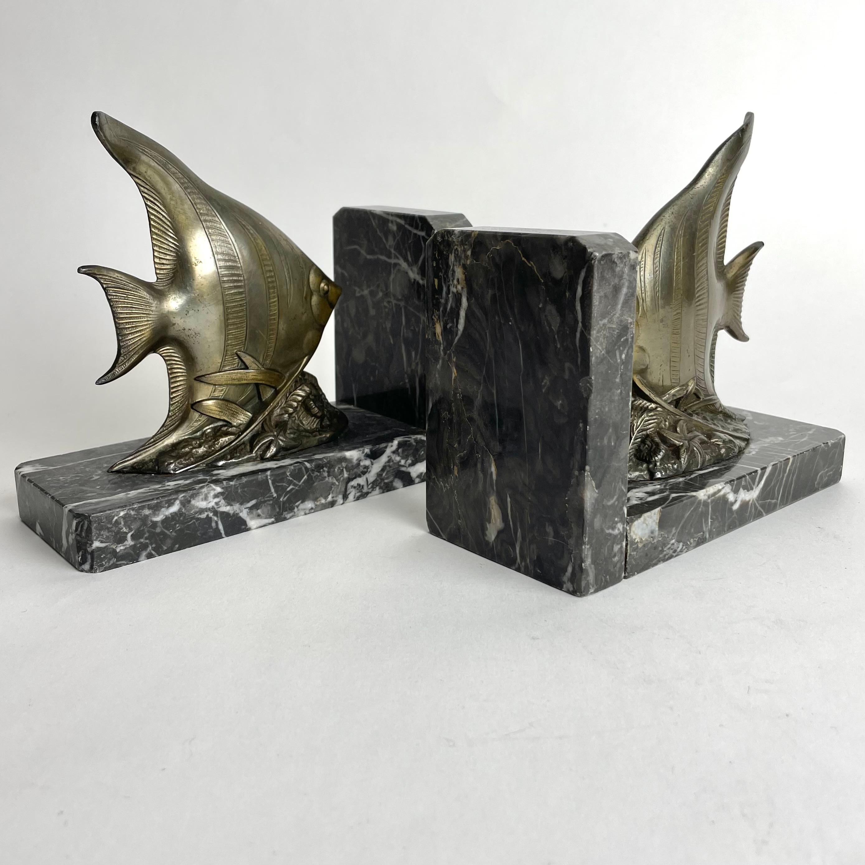 Patinated Beautiful pair of Art Deco Bookends from the 1930s with very period fishes For Sale
