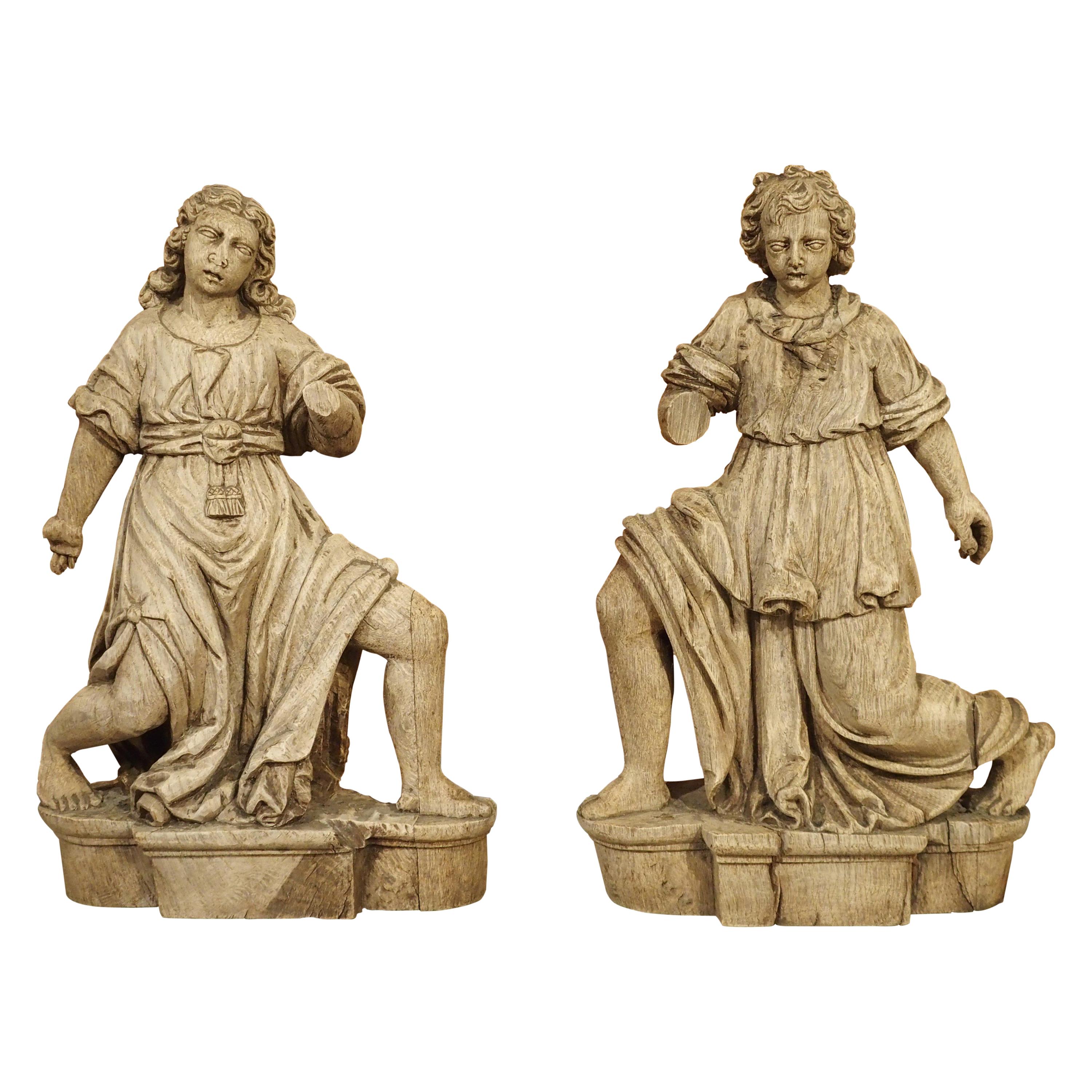 Beautiful Pair of Baroque Angels from France in Carved Oak For Sale