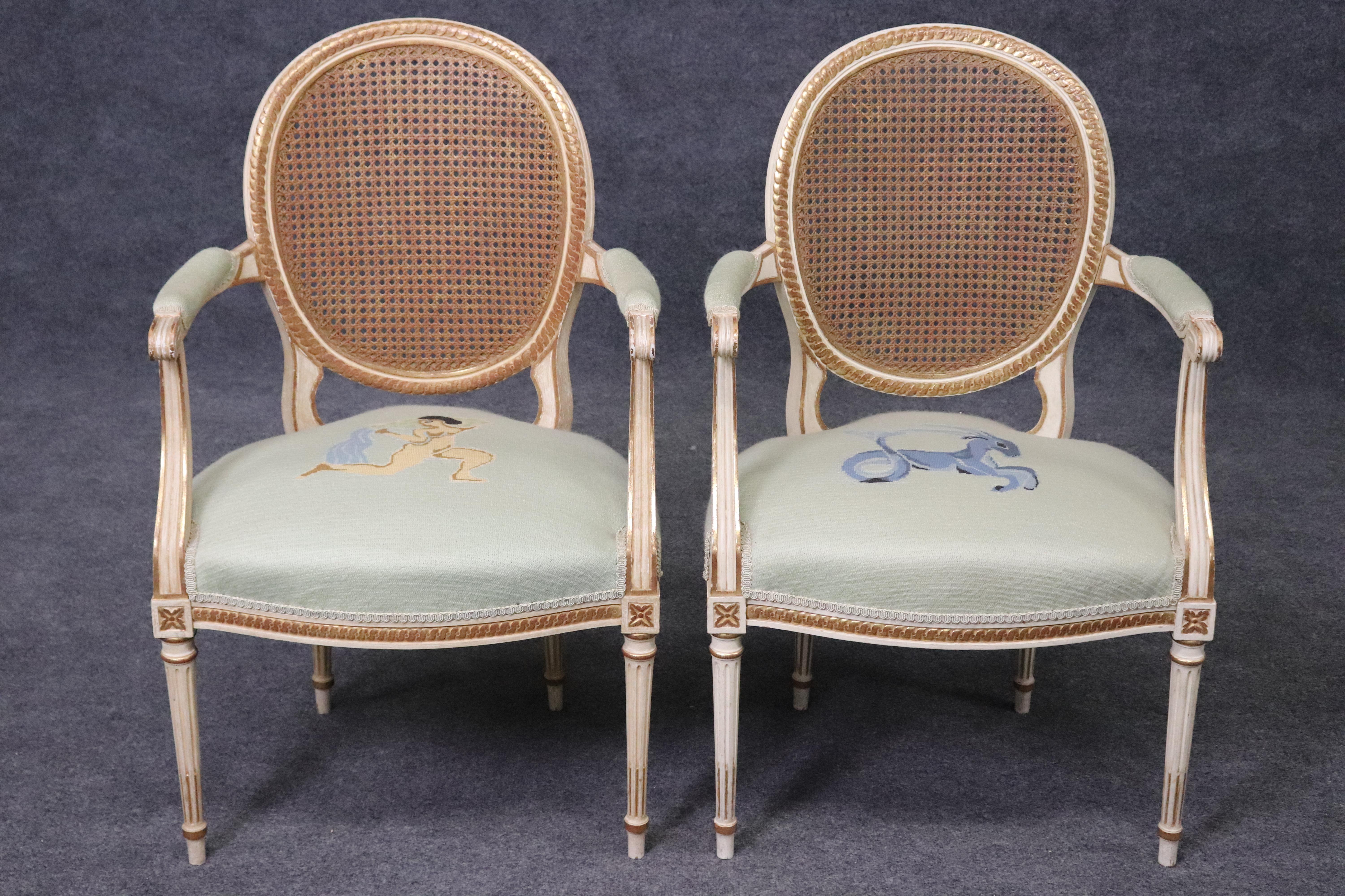 Mid-20th Century Beautiful Pair of Cane Back French Louis XVI Needlepoint Armchairs For Sale