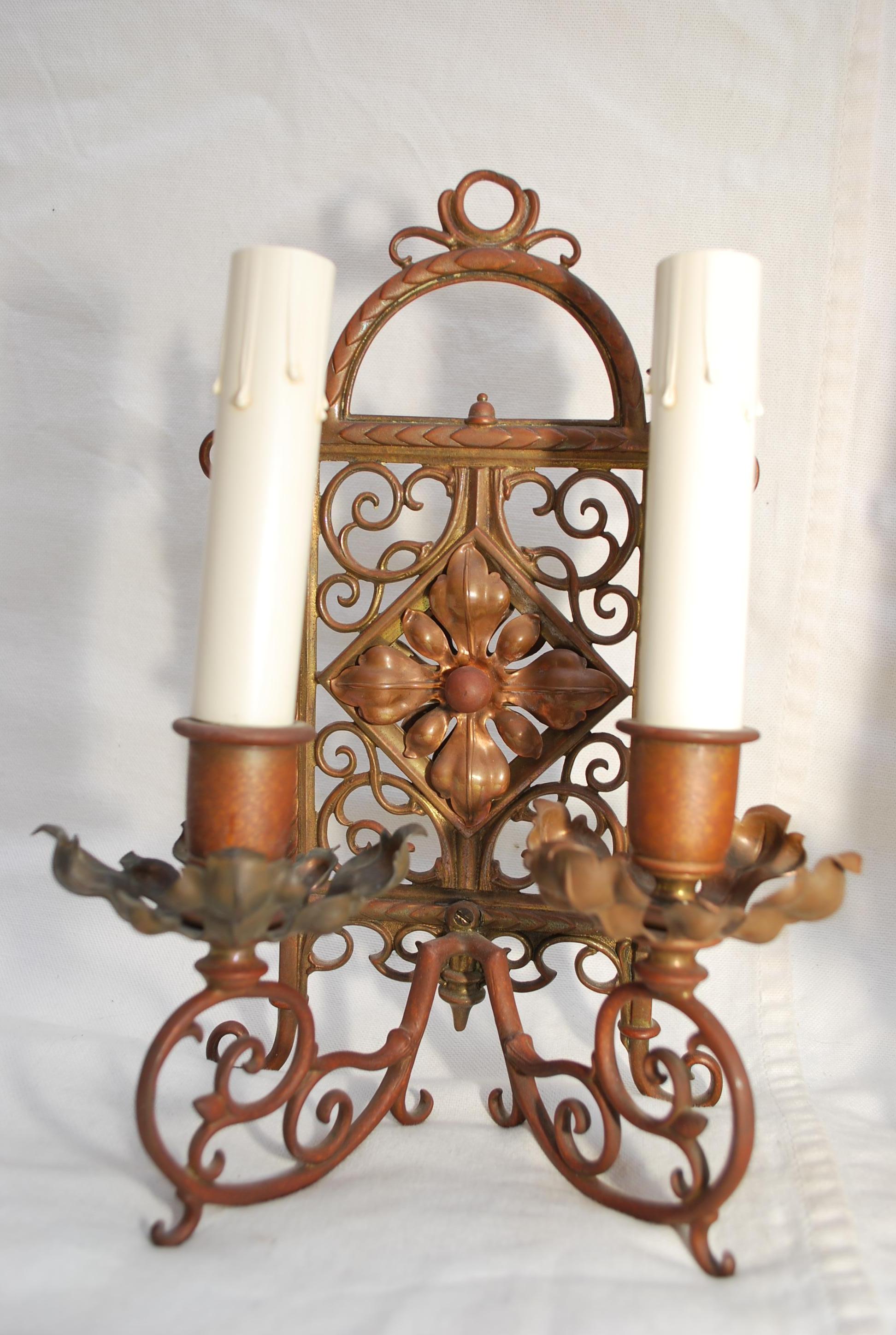 A beautiful Pair of French  late 19 th century Bronze sconces, the patina is so much nicer in person