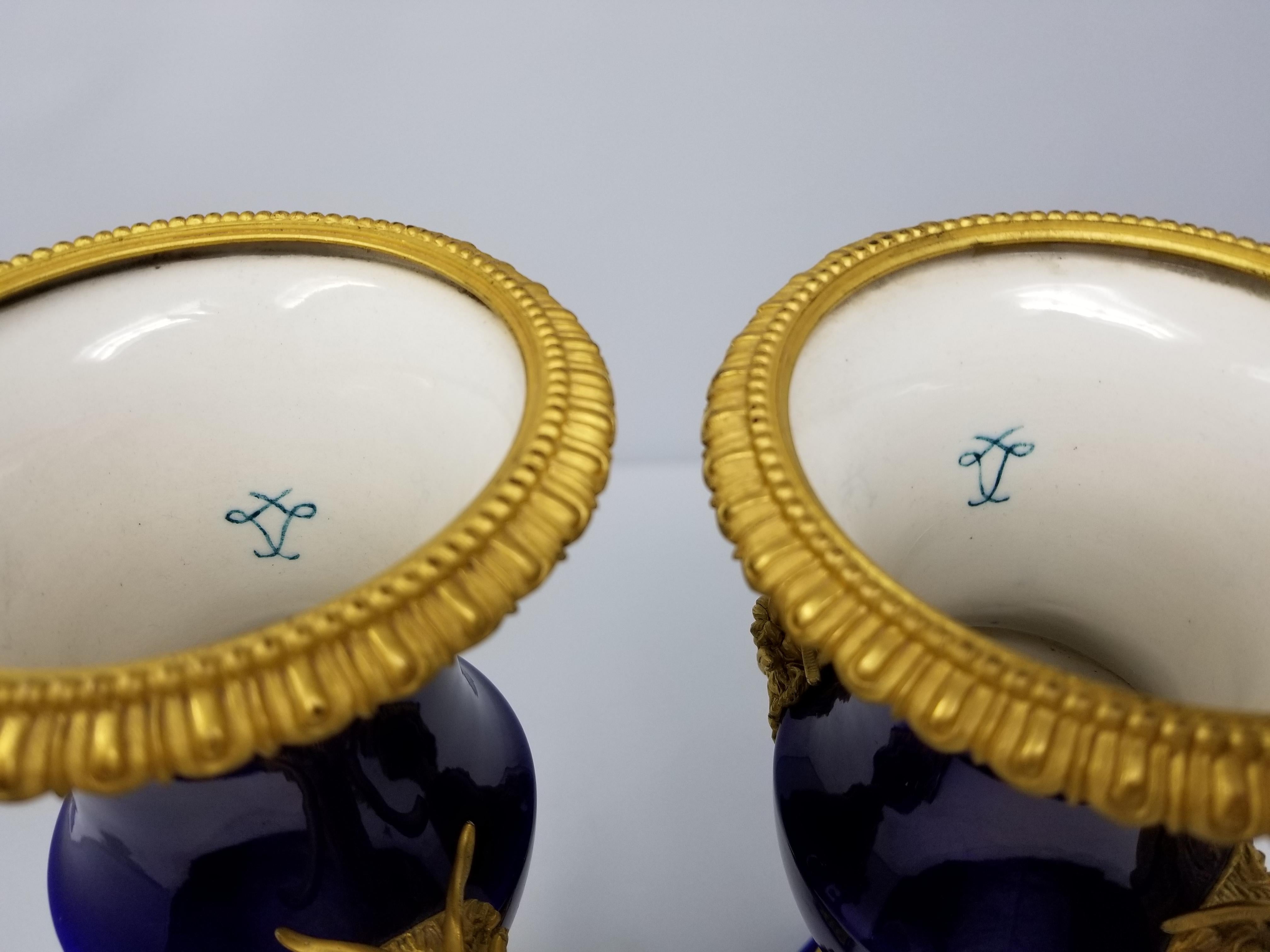 Bronze Beautiful Pair of French Louis XVI Sevres Cobalt Blue Porcelain and Ormolu Vases For Sale