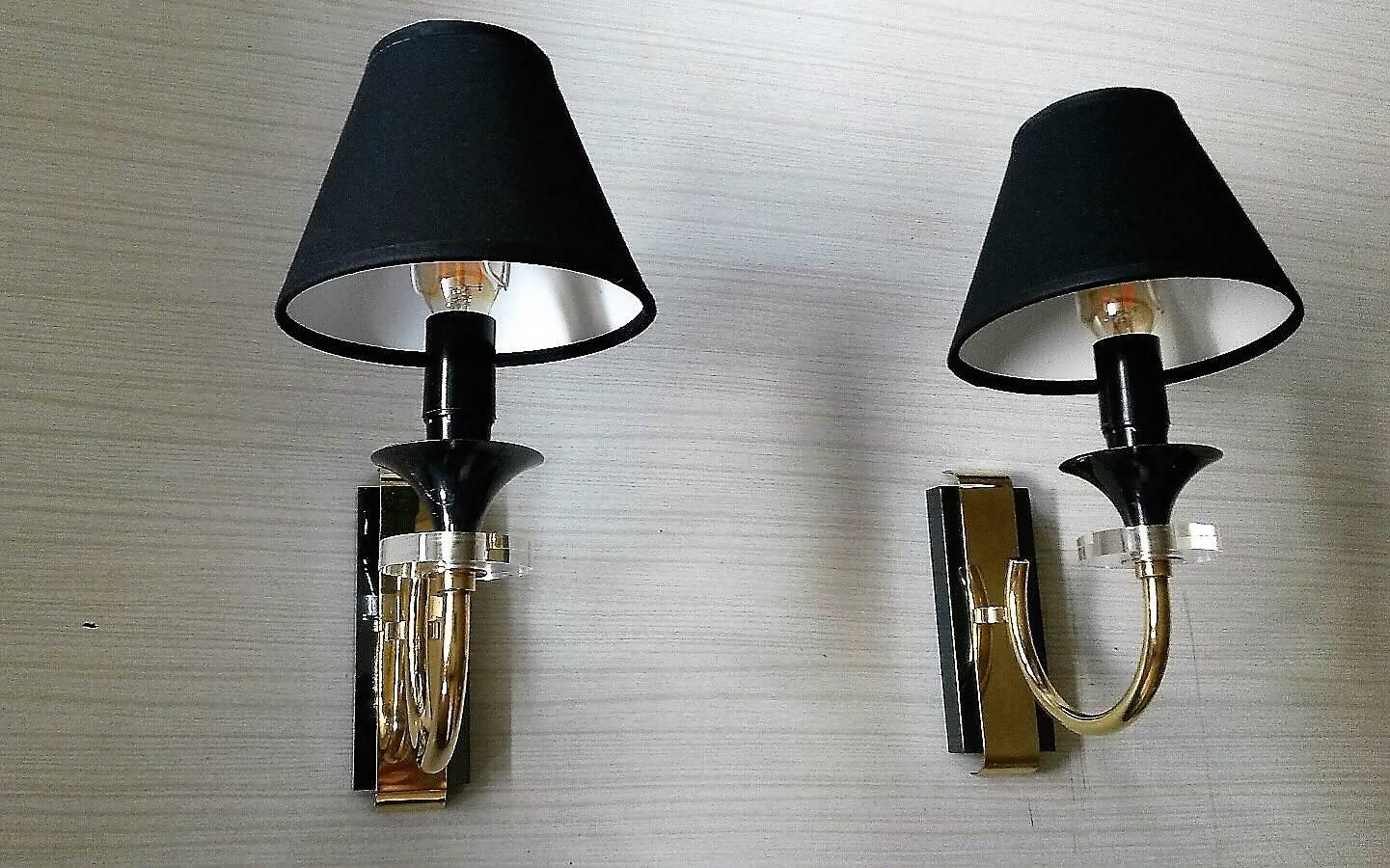 Beautiful pair of one-arm French neoclassical style sconces, 1950s. In gilt bronze and metal gun patina, Lucite glass and new black cotton lampshades.
In a very good  general condition, newly rewired for the US standards.

 