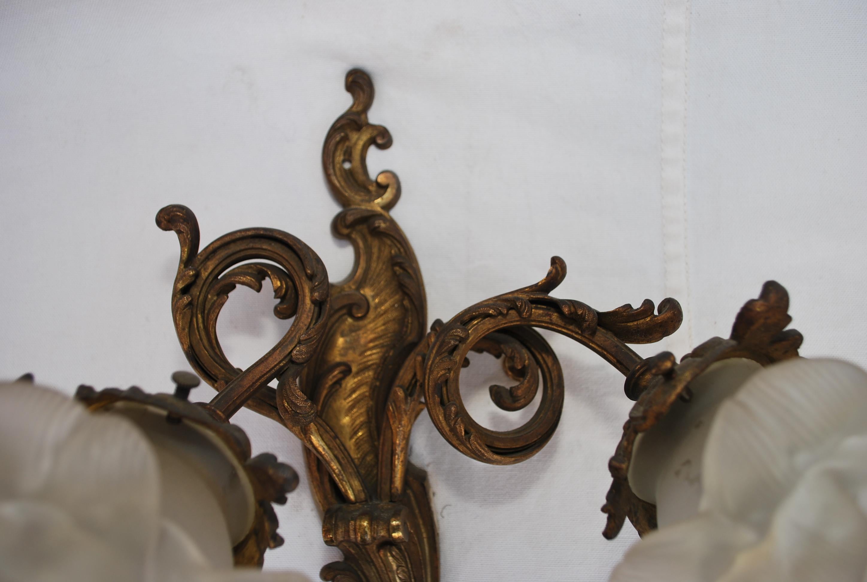 A beautiful pair of solid bronze sconces, the patina is so much nicer in person, I am sorry I realize way after taken the pictures, the glasses are dirty, they will be cleaned