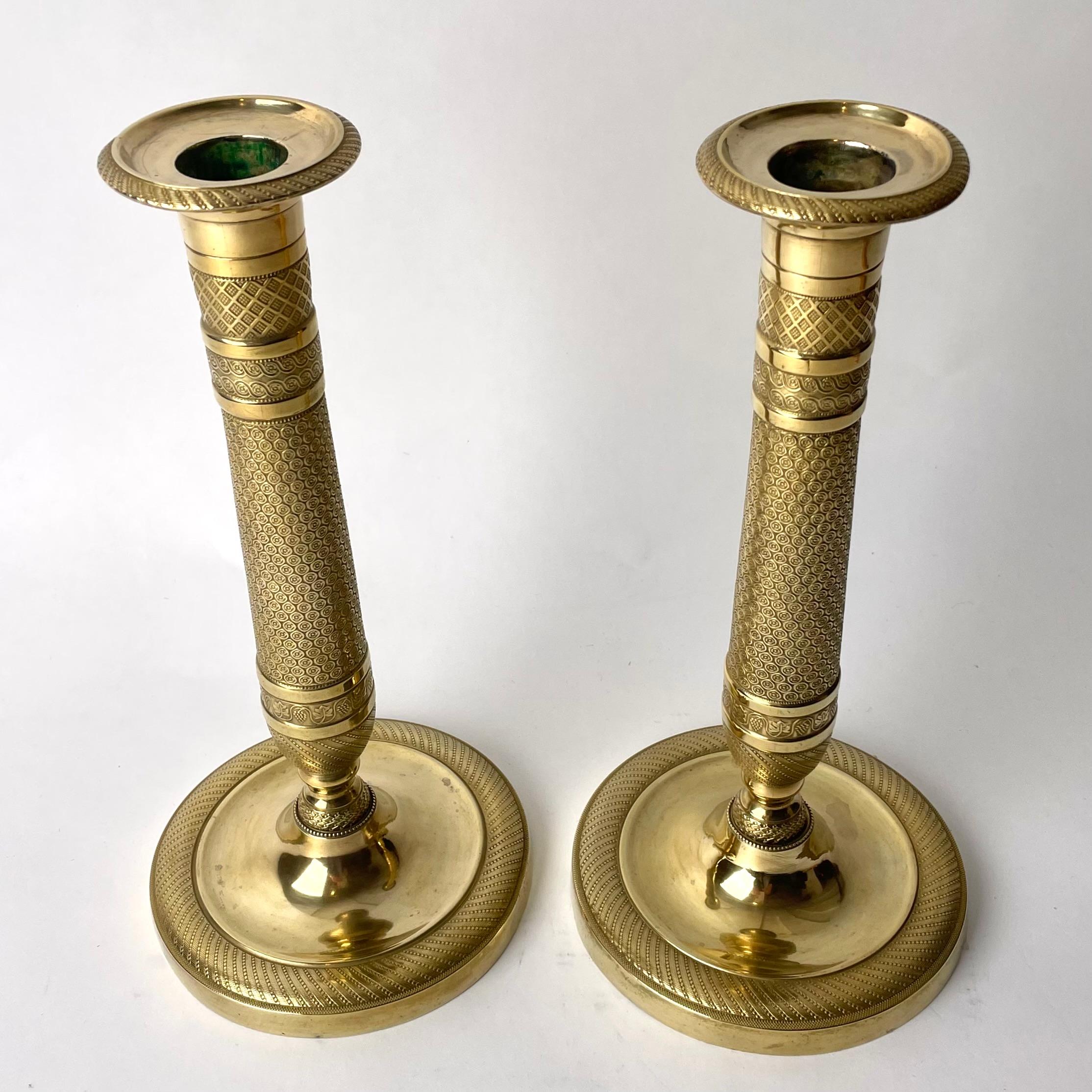 Gilt Beautiful pair of gilt Empire Candlesticks from 1820s For Sale