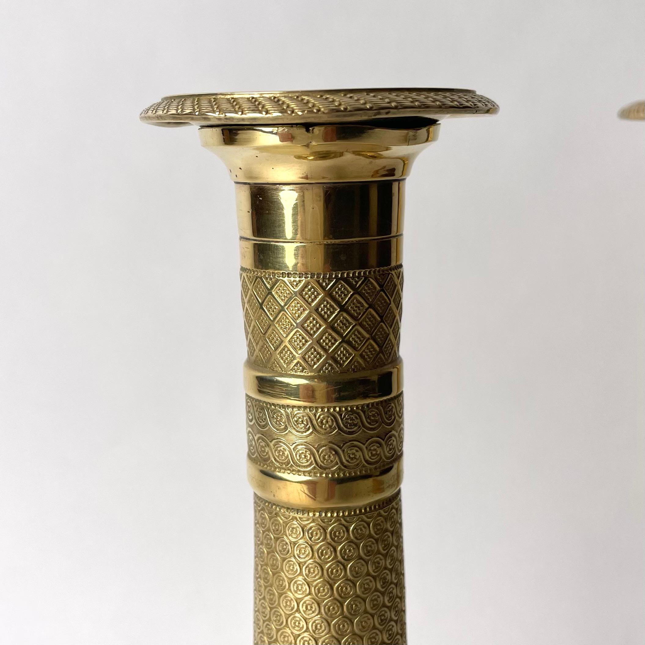 Bronze Beautiful pair of gilt Empire Candlesticks from 1820s For Sale