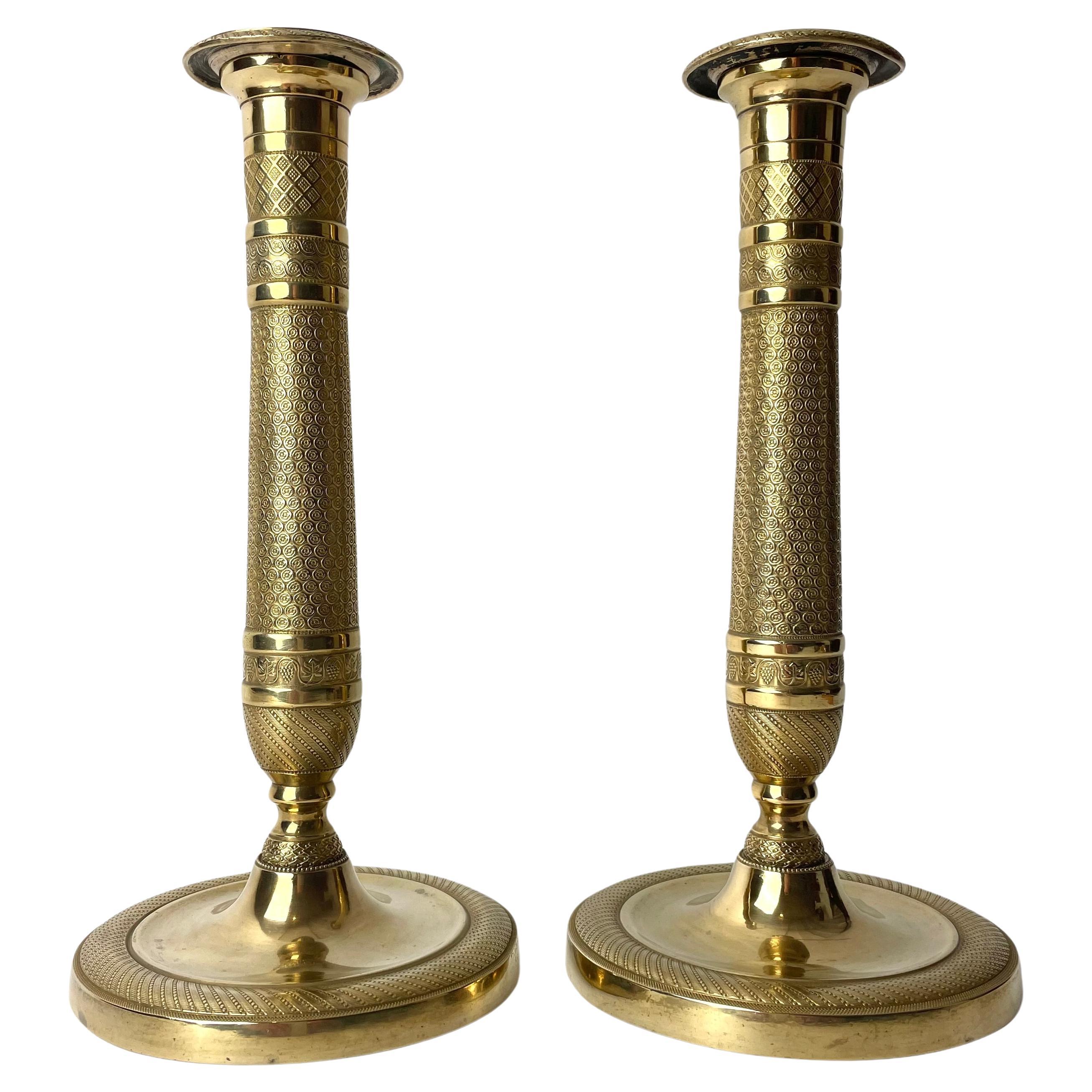 Beautiful pair of gilt Empire Candlesticks from 1820s For Sale