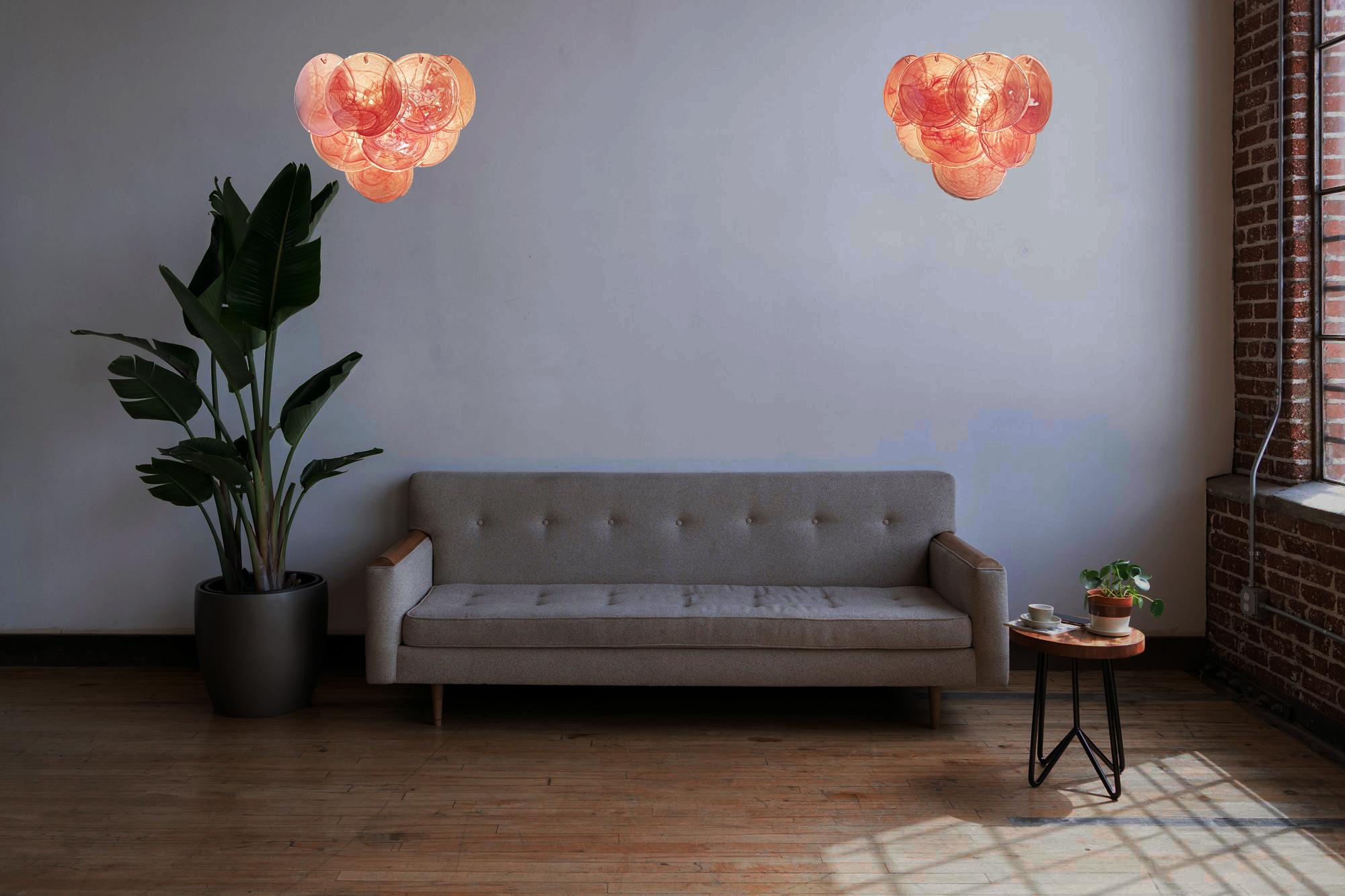 20th Century Beautiful Pair of glass wall sconces - 10 iridescent alabaster pink discs