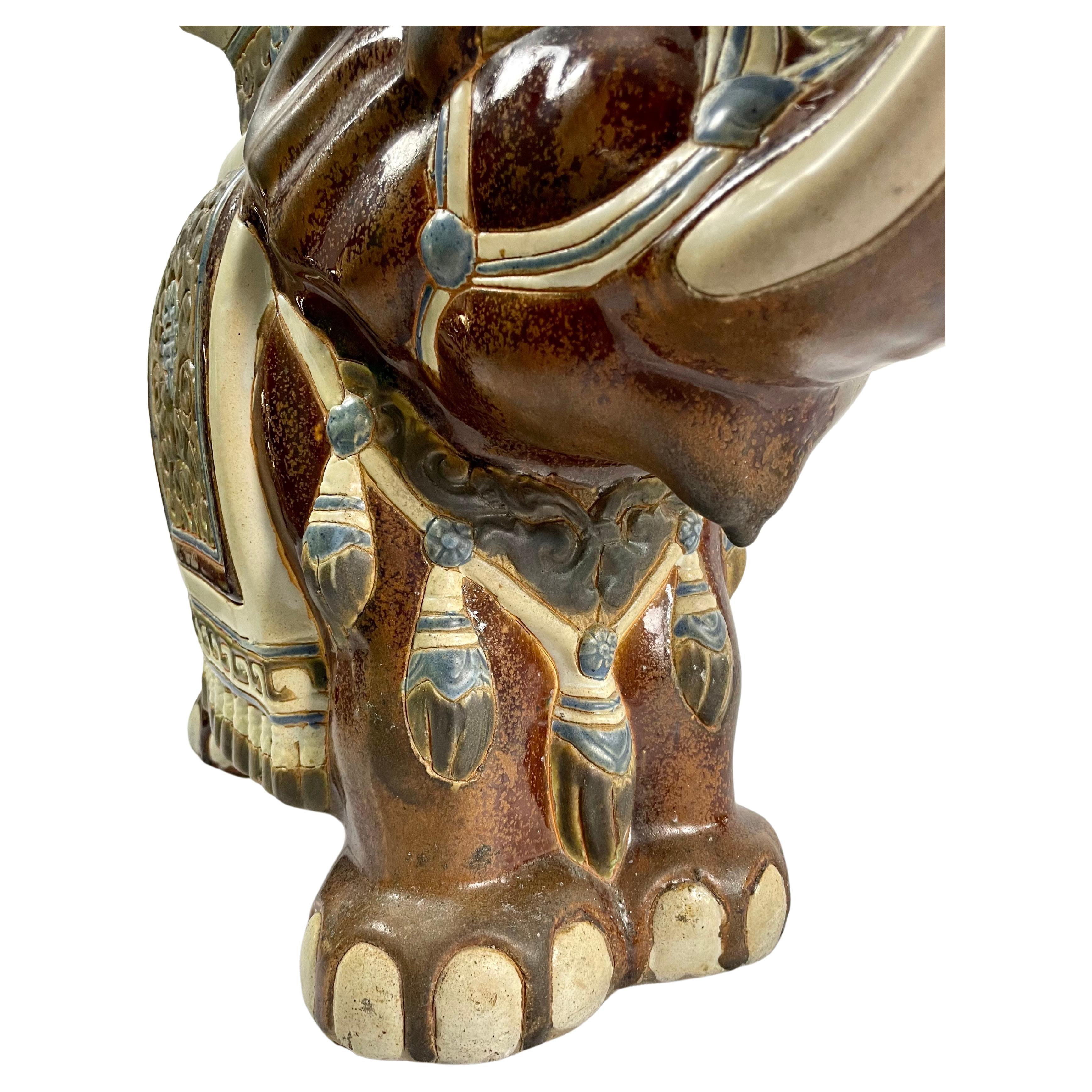 Enameled Pair of brown glazed ceramic elephants, garden stools or plant holders, China  For Sale