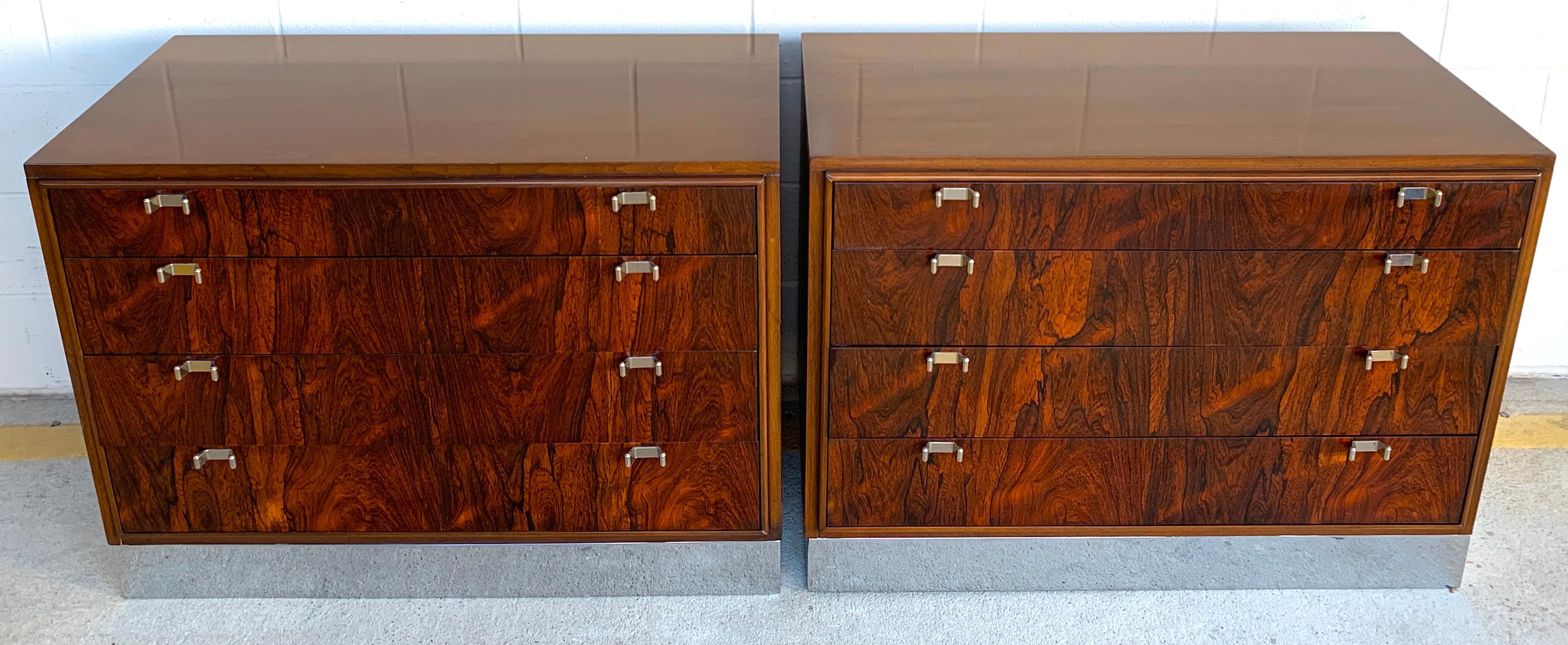 Beautiful pair of John Stuart rosewood and polished chrome chests, restored
each one with a mahogany case with four inset rosewood front drawers, raised on a polished chrome pedestal base.