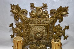 Magnifique paire d'appliques françaises en bronze de la fin du XIXe siècle avec dauphins