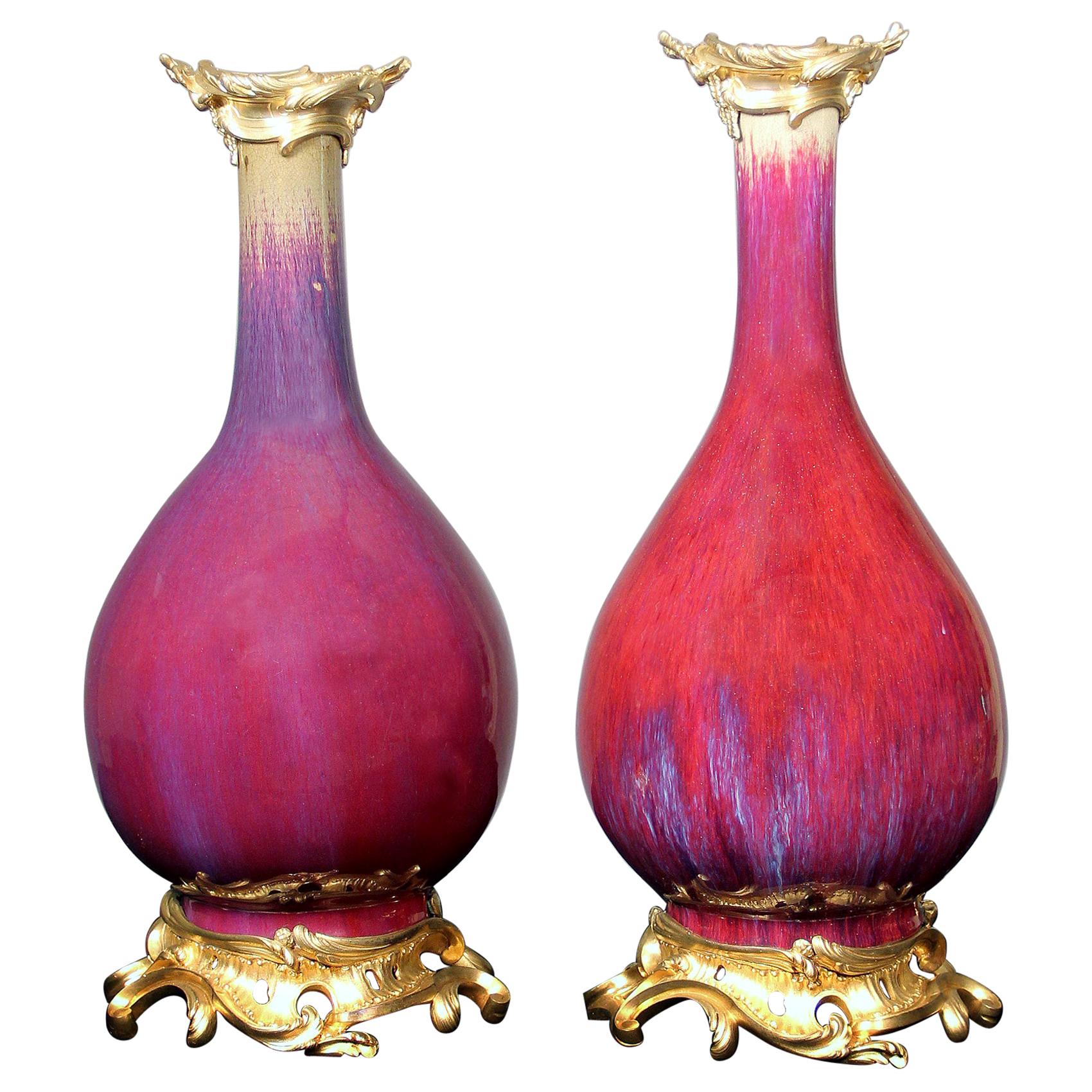 Beautiful Pair of Late 19th Century Gilt Bronze “Sang de Boeuf” Porcelain Vases