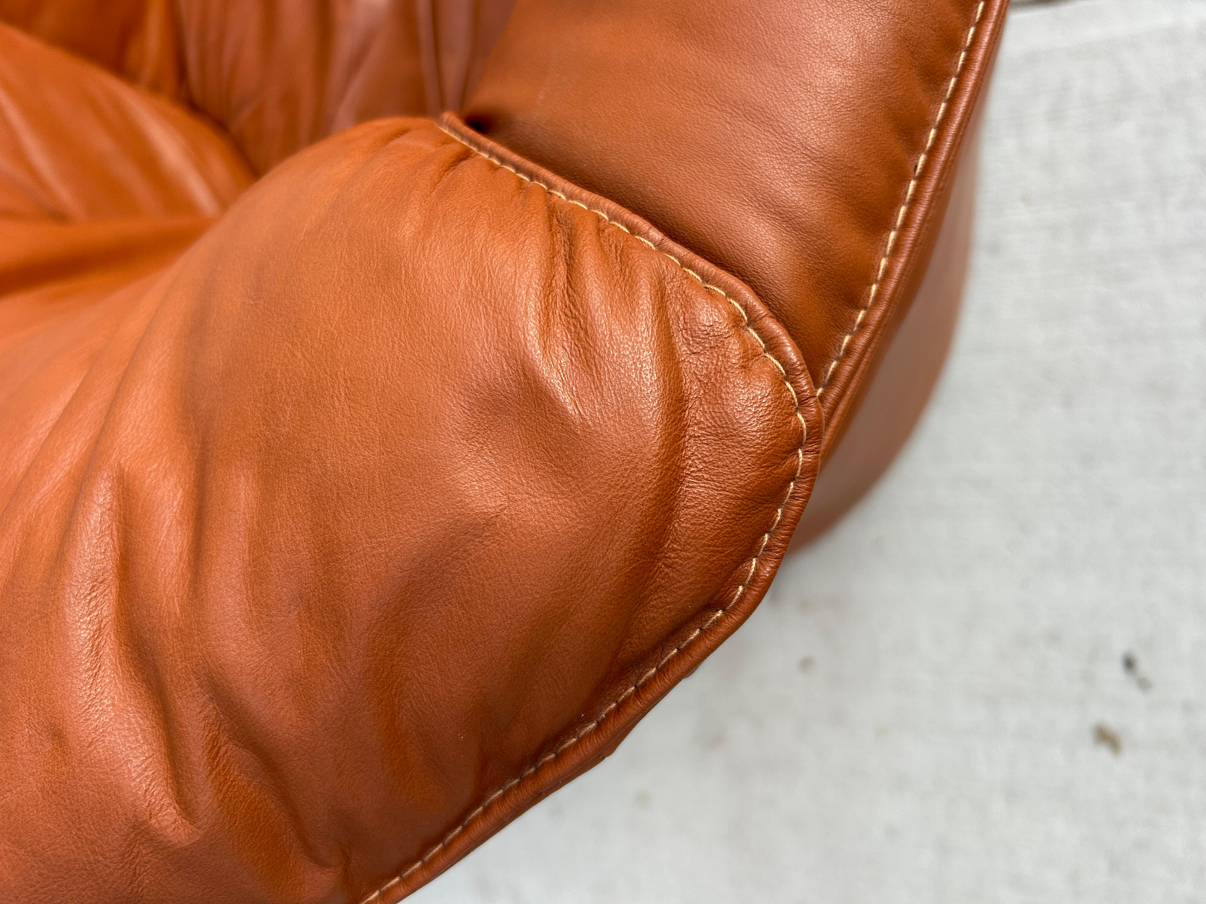 natuzzi leather swivel chairs