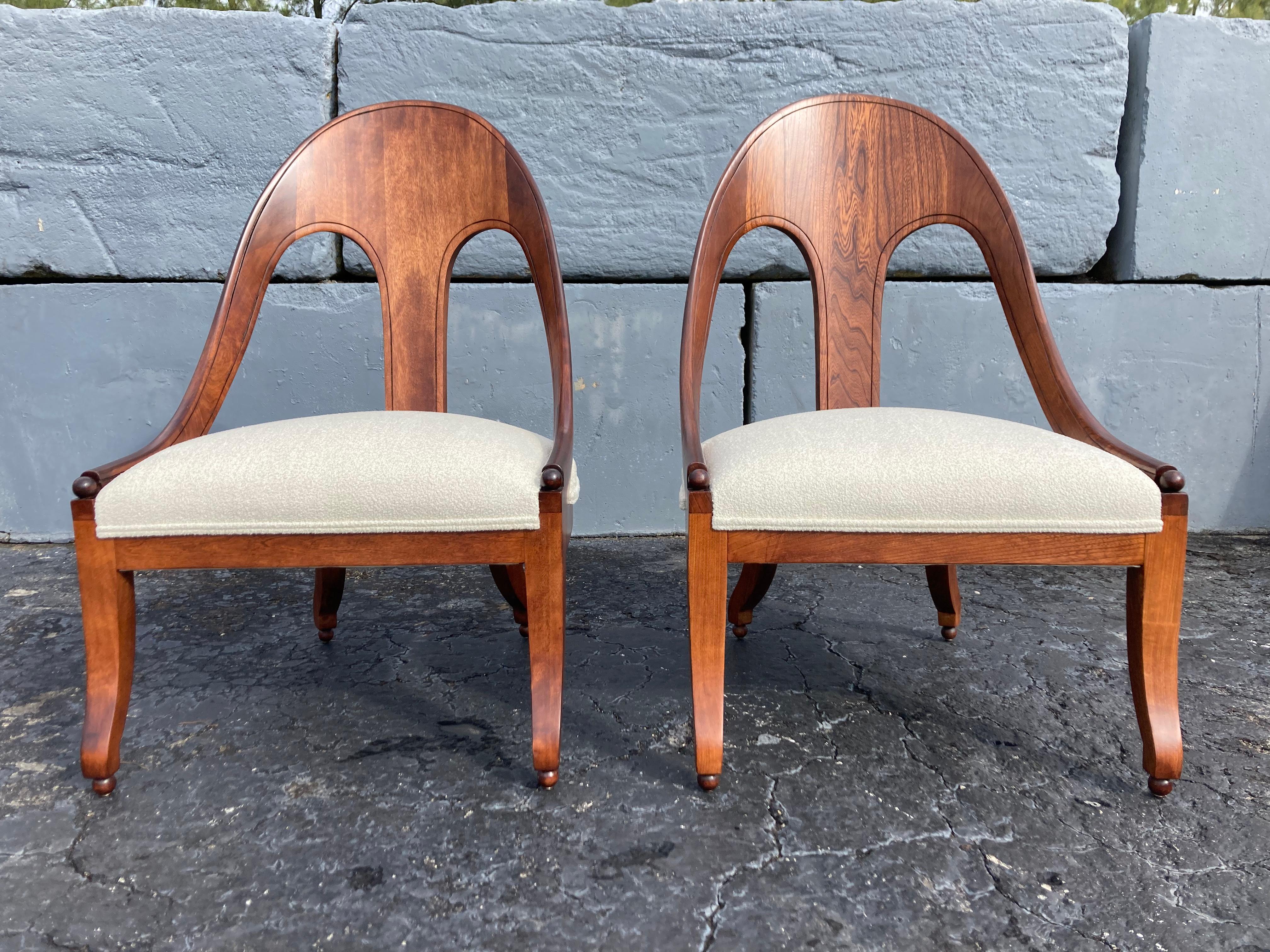 Beautiful lounge chairs in excellent condition. Quality craftsmanship with many great details. Original 1950s. Wood has been refinished and seats have been reupholstered. Ready for a new home.
