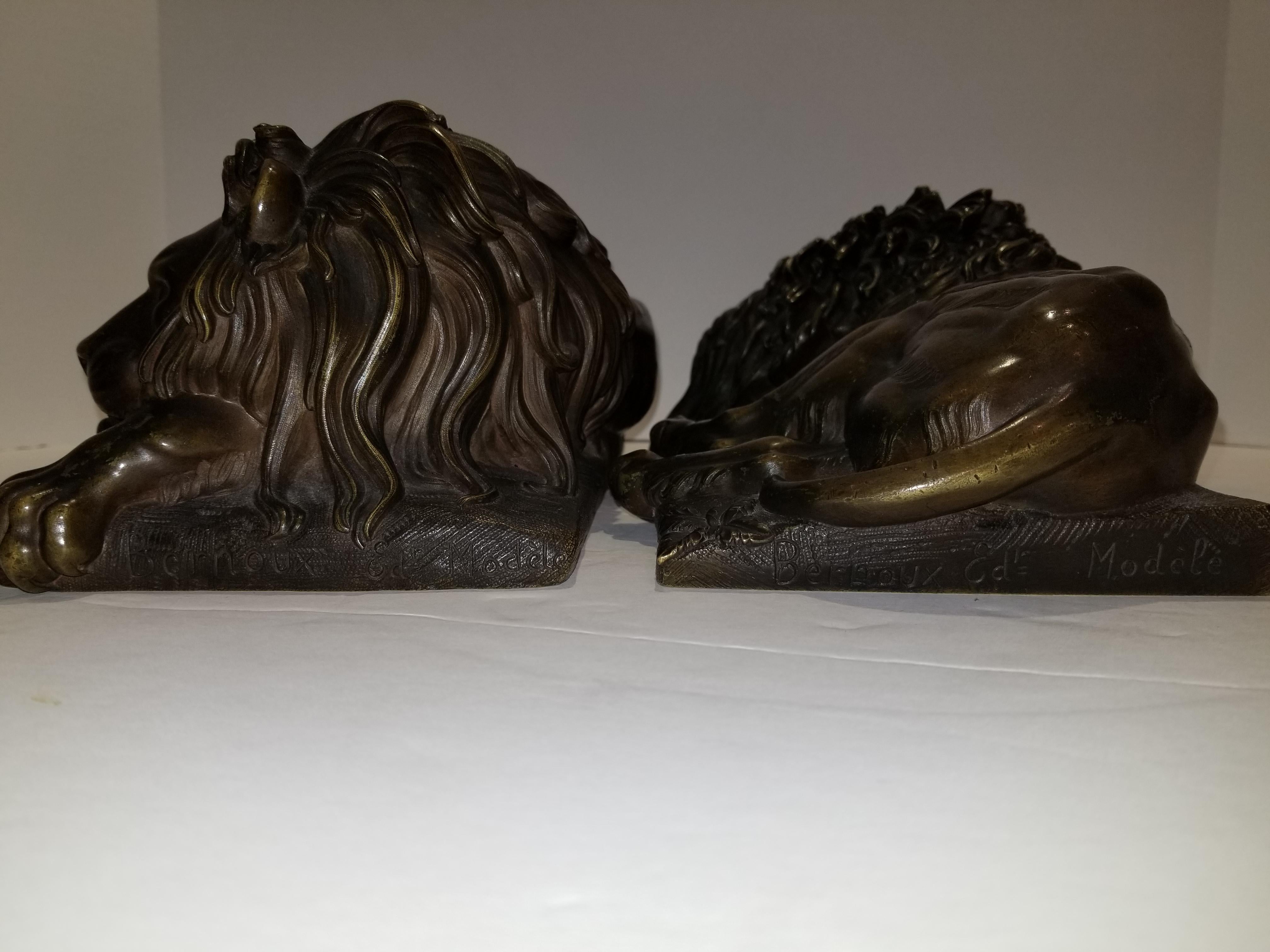 Beautiful Pair of Patinated Resting Lions, Signed by Bernoux and Huzel For Sale 1