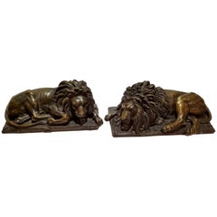 Beautiful Pair of Patinated Resting Lions, Signed by Bernoux and Huzel