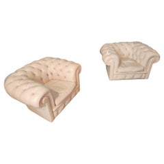Beautiful pair of powder pink Poltrone Frau chairs