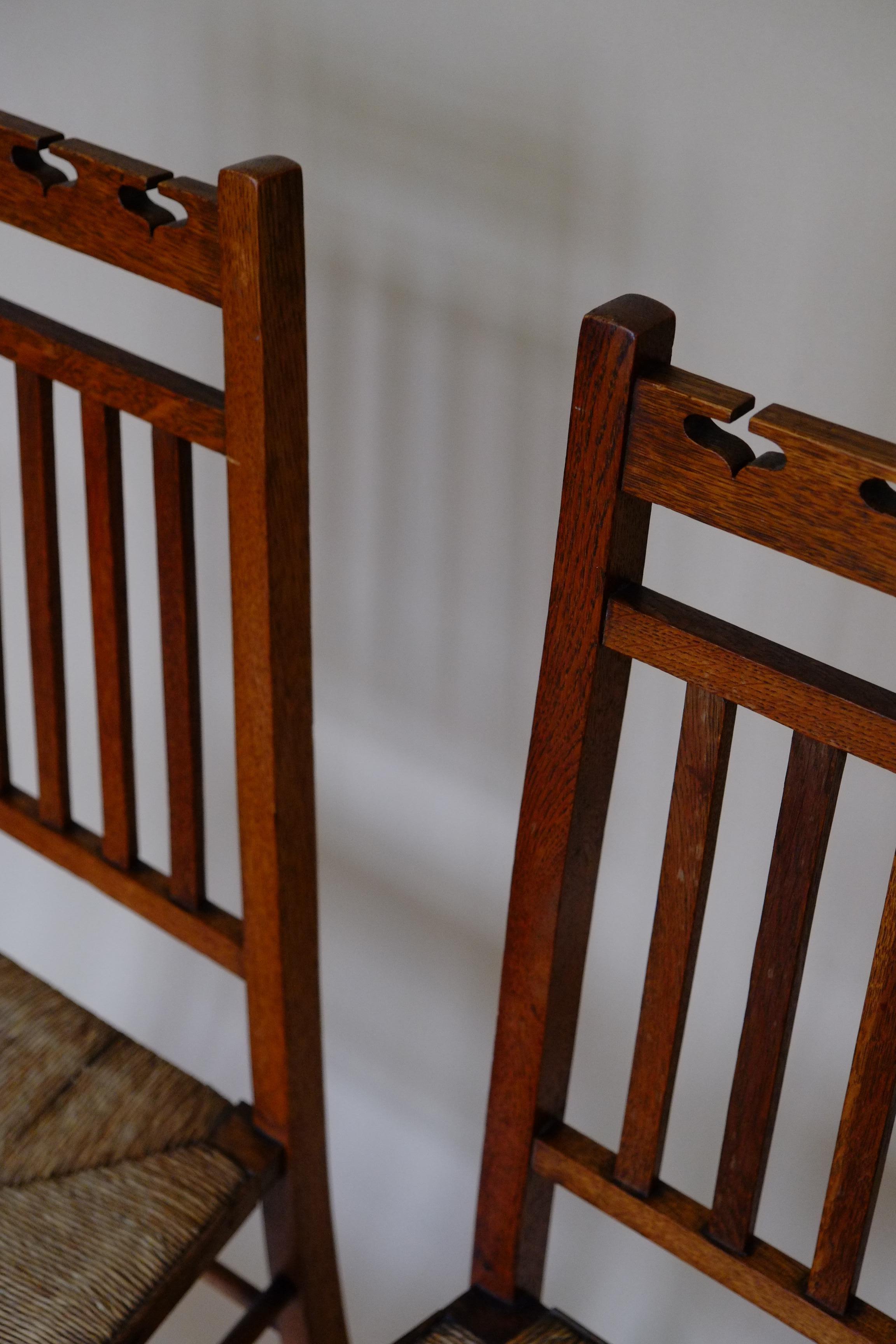 20th Century Beautiful Pair of Scottish Arts & Crafts Oak Bedroom Side Chairs by E A Taylor For Sale