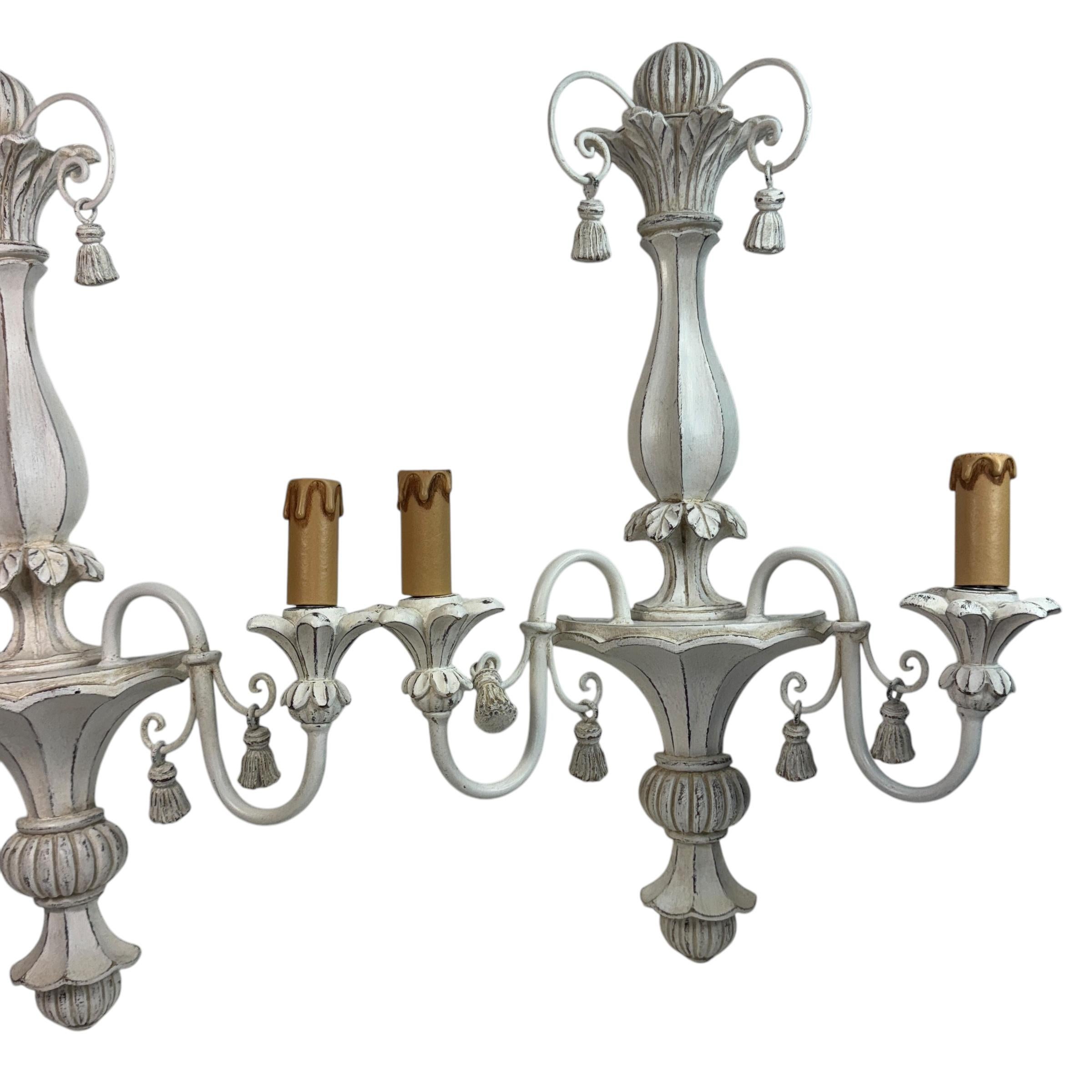 A beautiful shabby white pair of Sconces made in Italy in the 1980s. Hand painted and beautiful.
Each Fixture requires two European E14 / 110 Volt Candelabra bulbs, each bulb up to 40 watts.
A nice addition to any room or your hallway. Found at an
