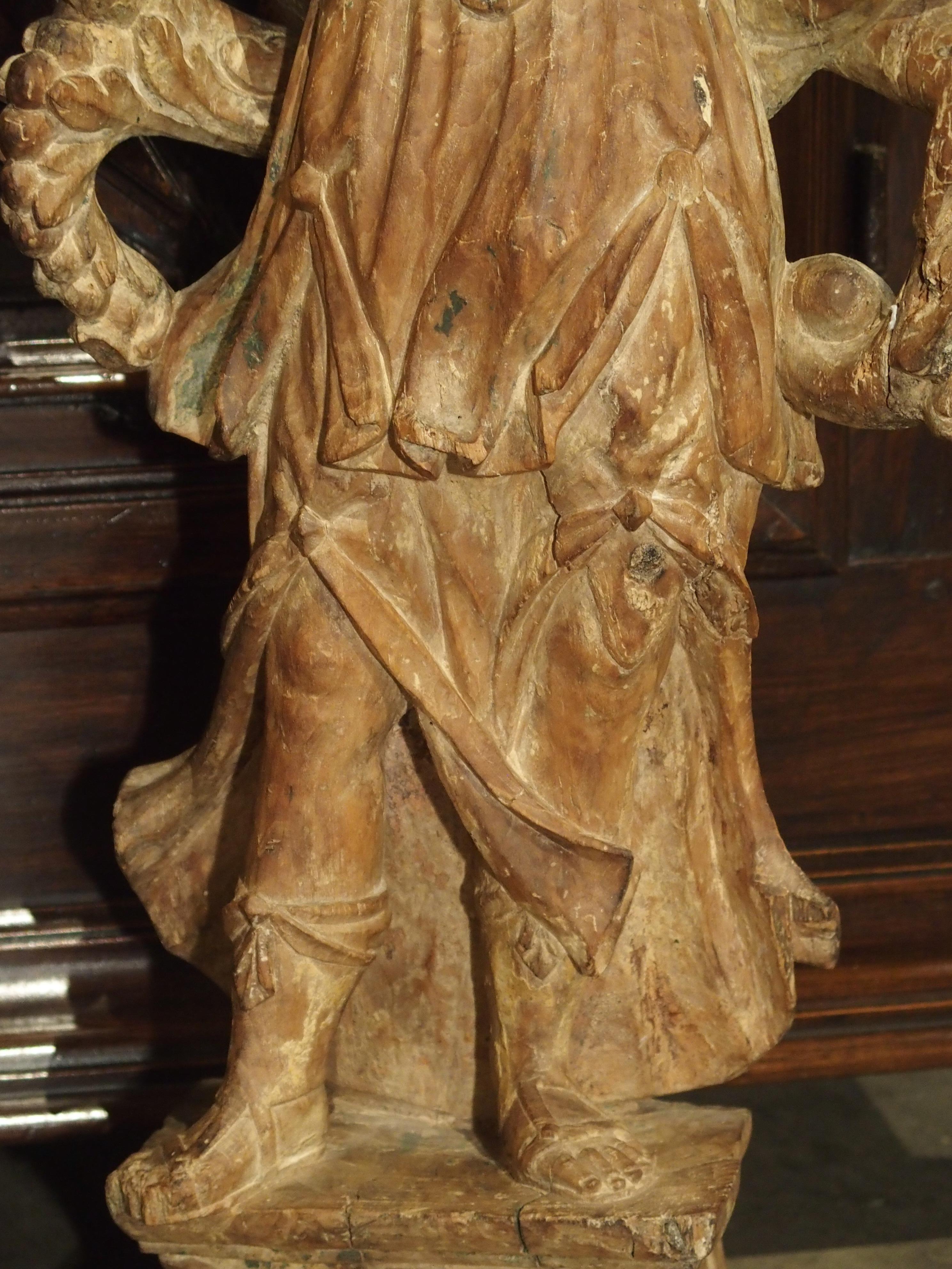 18th Century and Earlier Beautiful Pair of Stripped 17th Century Italian Torchbearer Candleholders