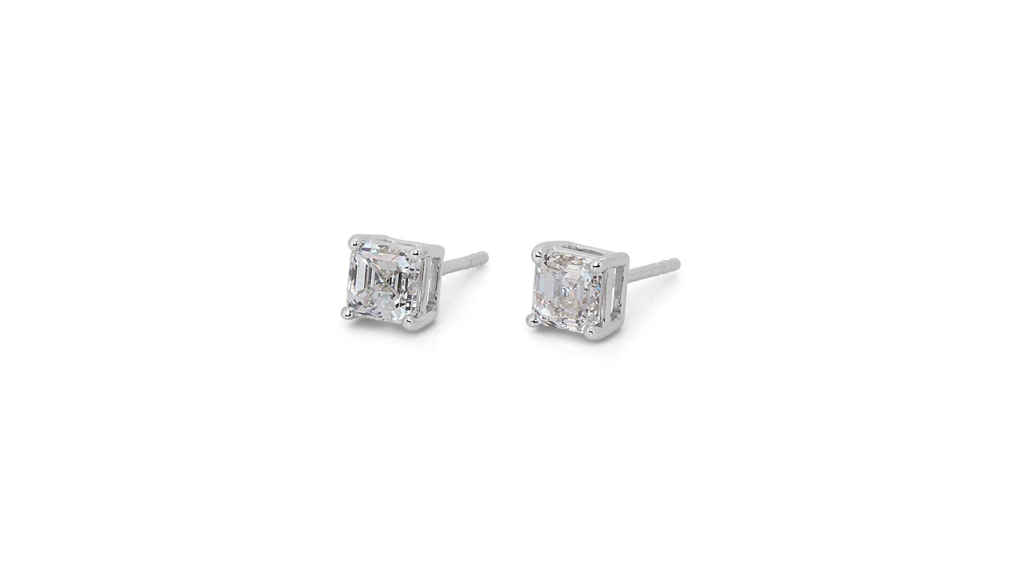 Beautiful pair of stud earrings with a dazzling 1.3 carat Asscher cut diamonds 1