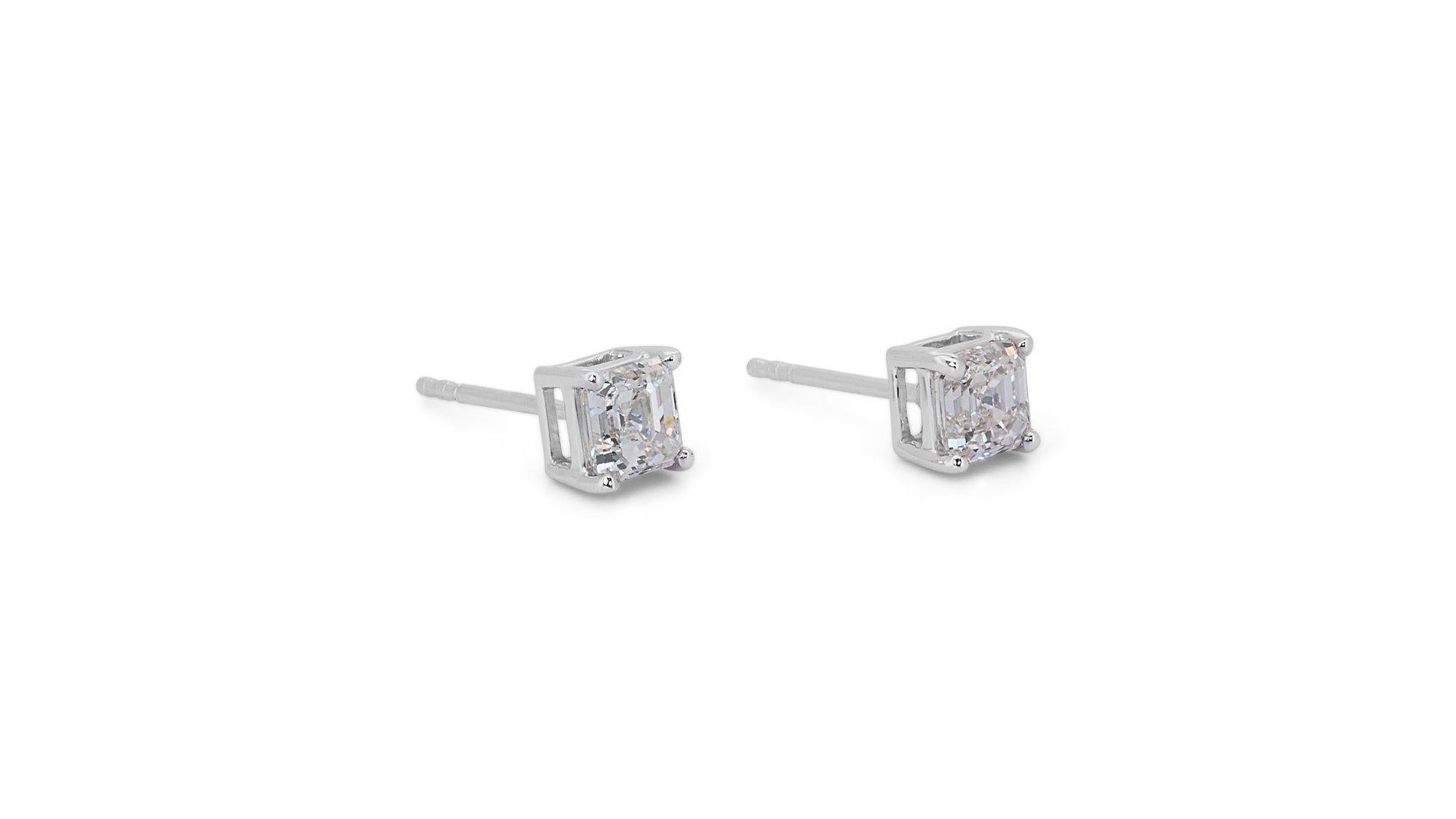 Beautiful pair of stud earrings with a dazzling 1.3 carat Asscher cut diamonds 2