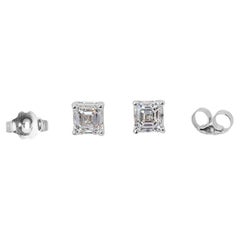 Beautiful pair of stud earrings with a dazzling 1.3 carat Asscher cut diamonds