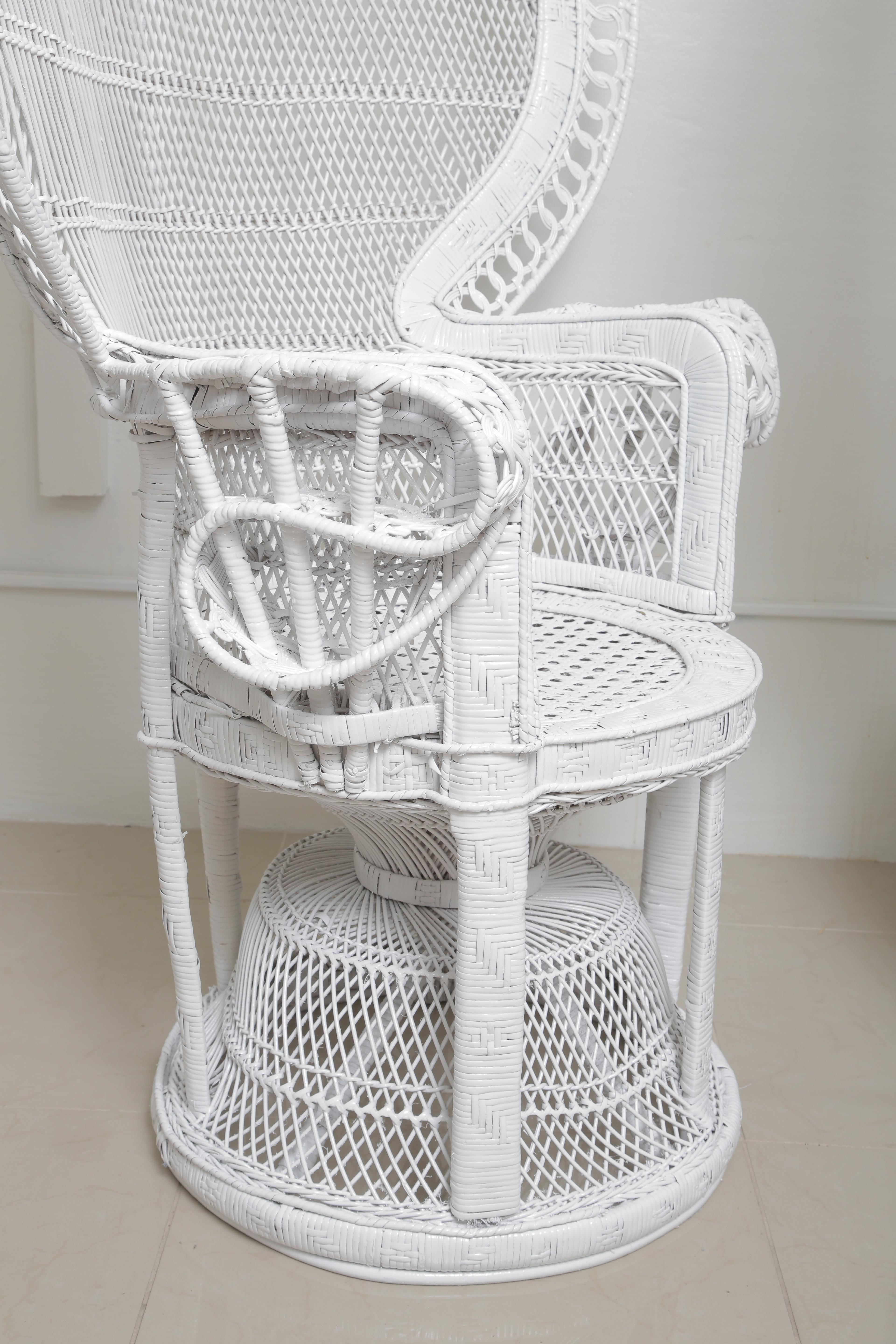 white peacock chairs