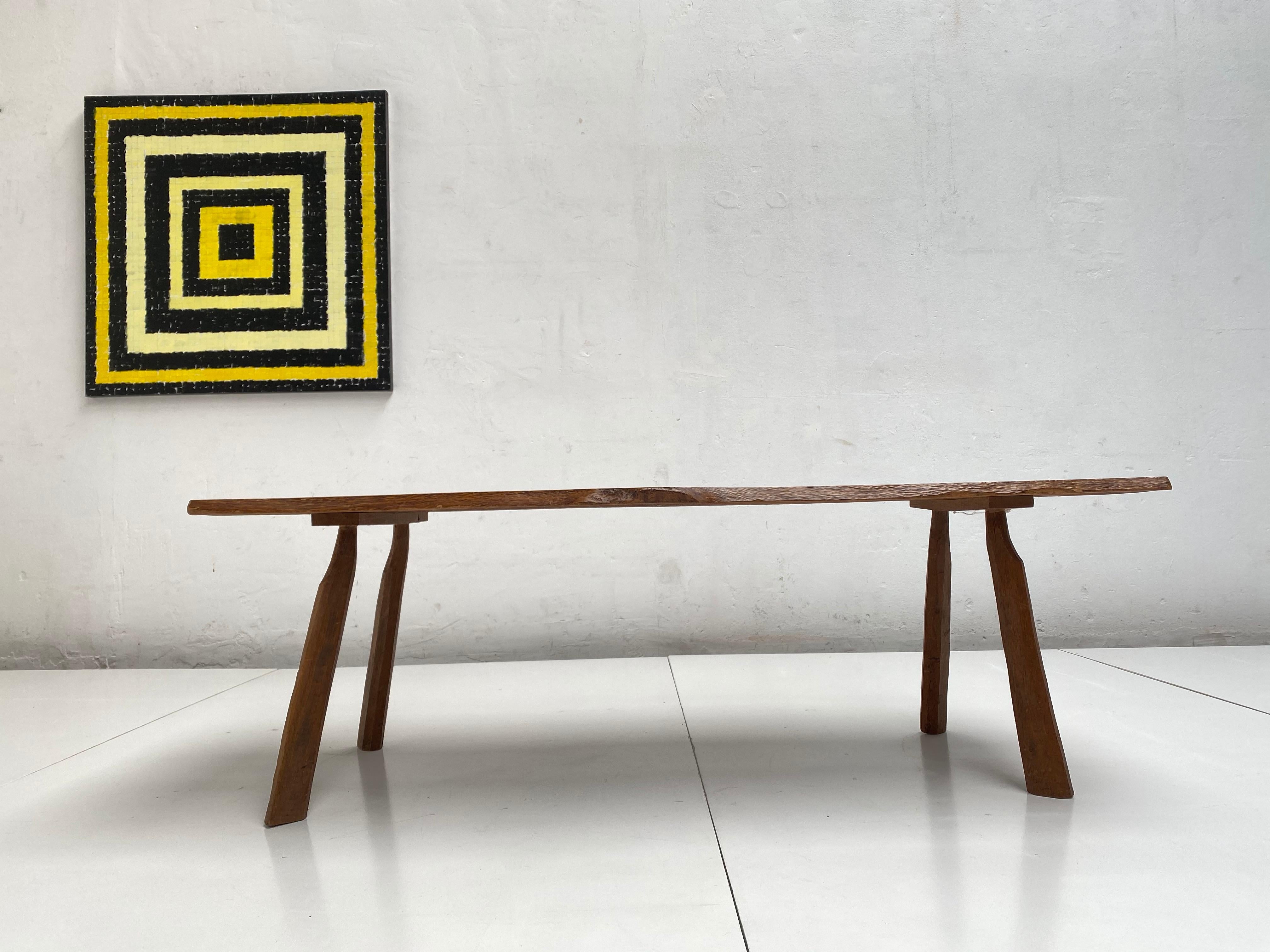 Beautiful coffee table from the 1960s in solid oak wood produced in the Netherlands.

The thin sliced solid oak wood top beholds a beautiful rich vintage patina and shows some nice details of the tree.

 