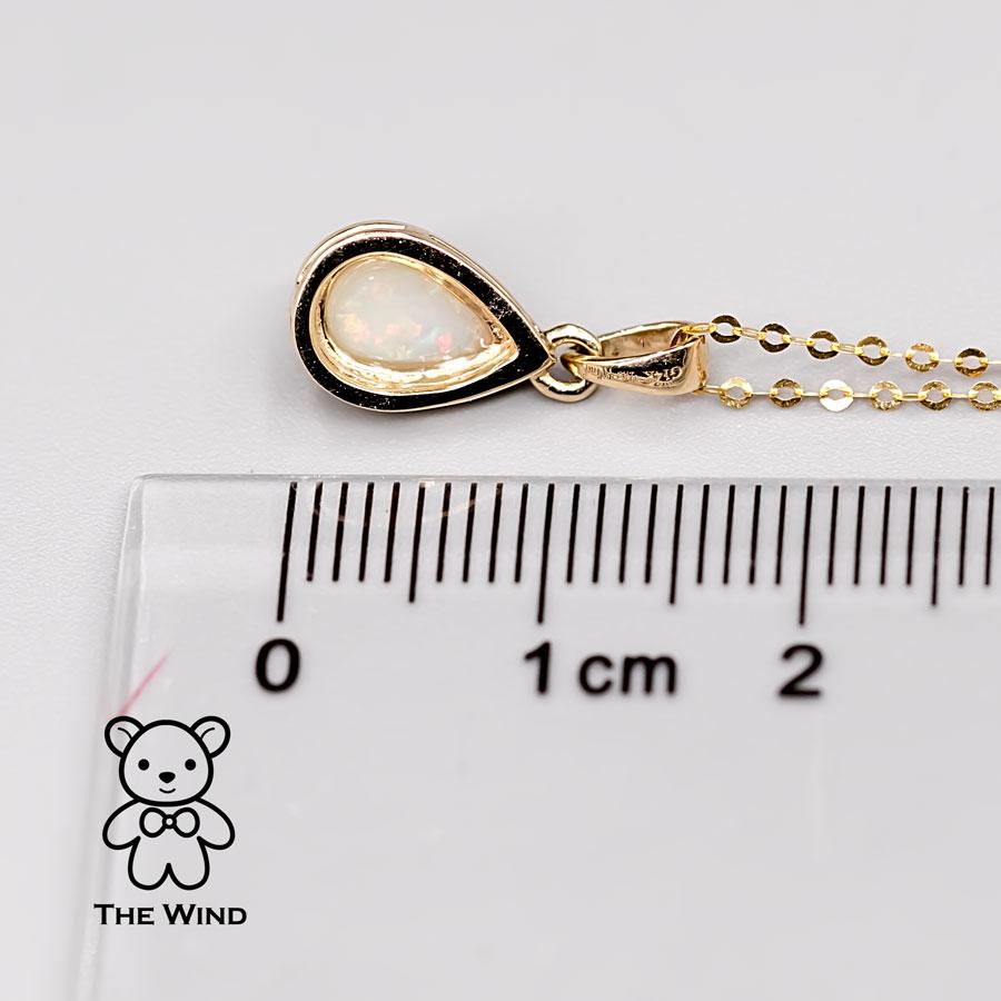 Arts and Crafts Magnifique collier pendentif en or jaune 14 carats avec opale australienne massive en forme de poire en vente