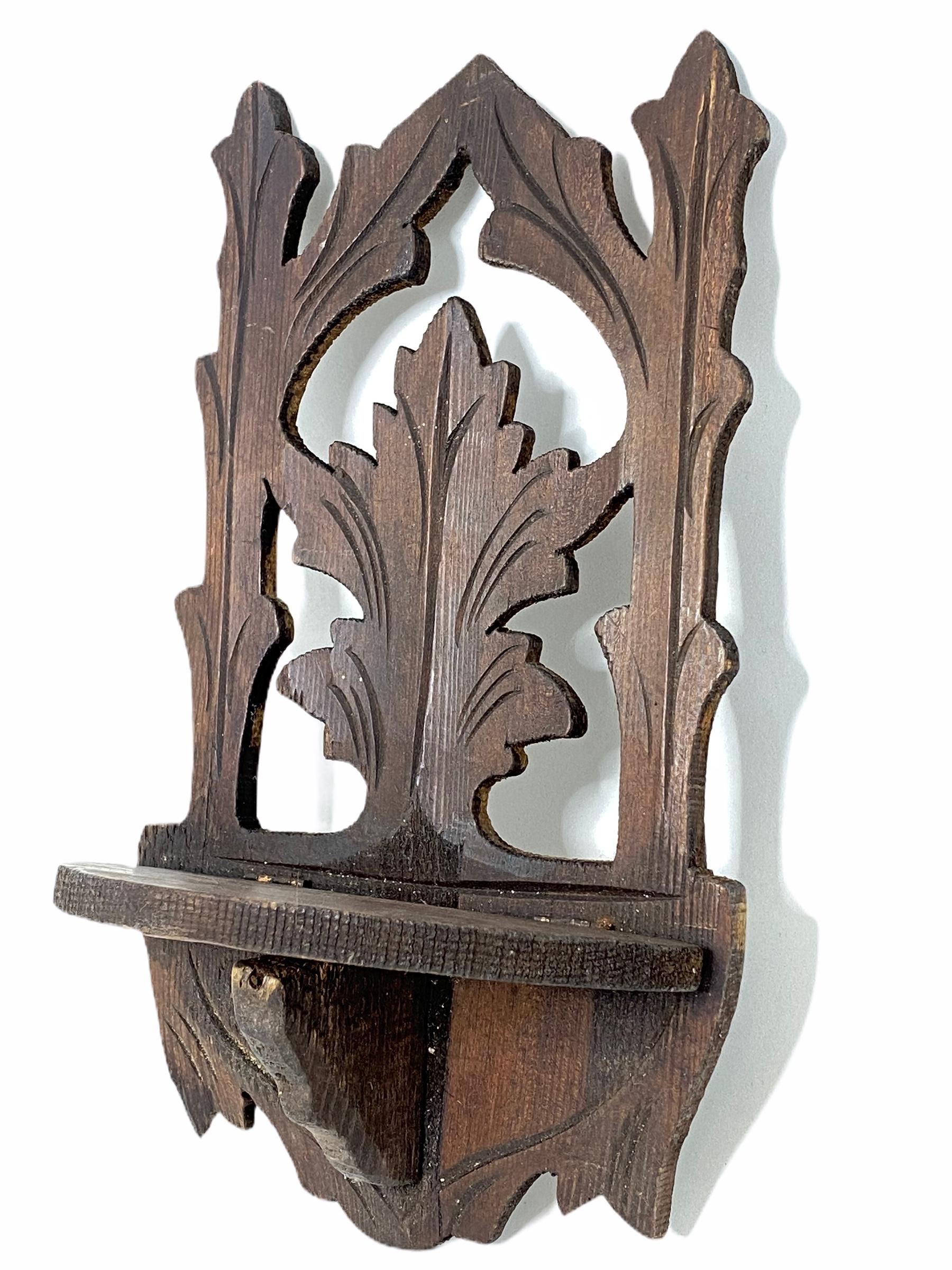 A lovely little shelf made of hand carved wood, made in the black forest area in Germany. Found at an estate sale in Nuremberg, Germany. It is not marked. A nice addition to your collection. It is in very good as found condition.