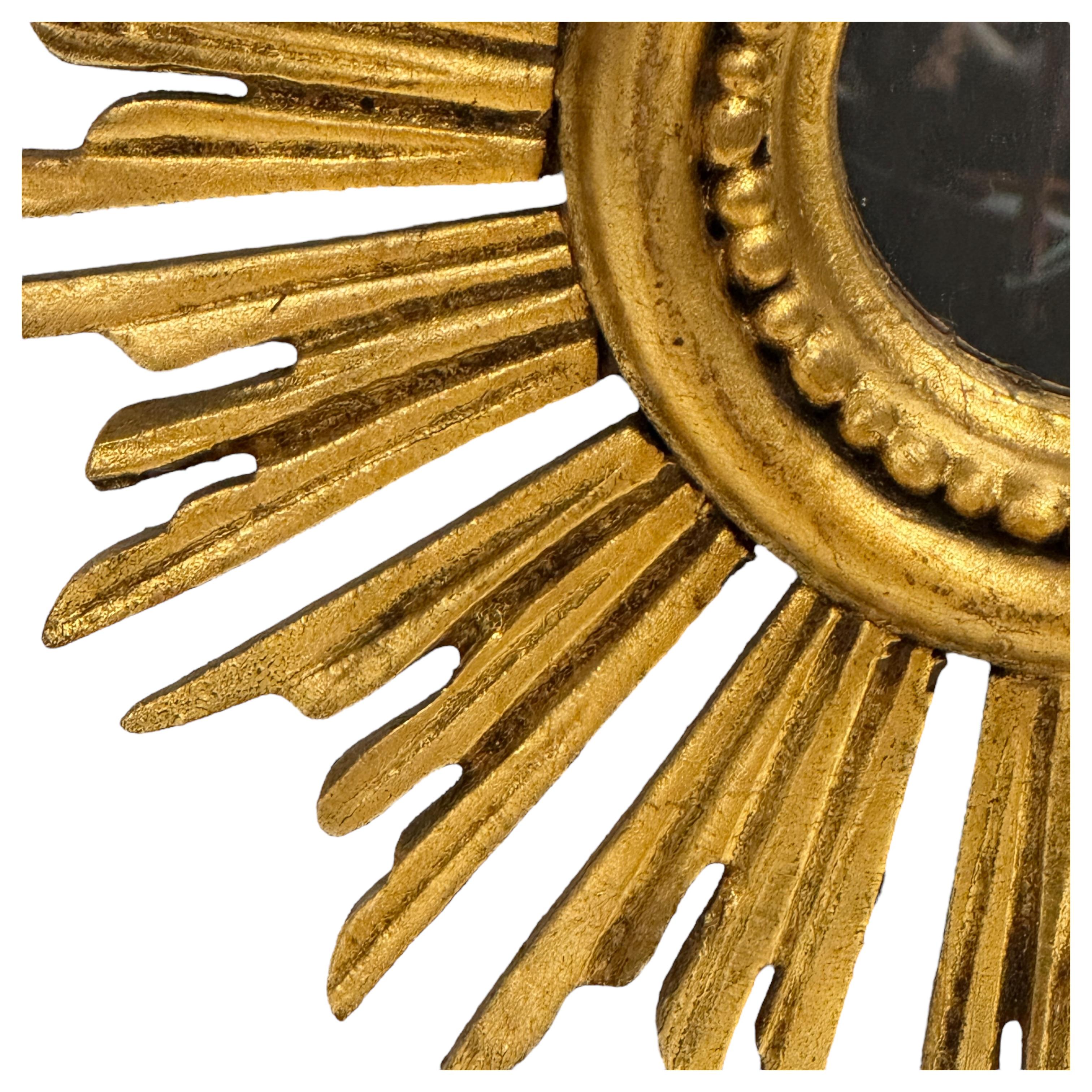 Hollywood Regency Beautiful Petite Starburst Sunburst Gilded Wood Mirror, Germany circa 1950s