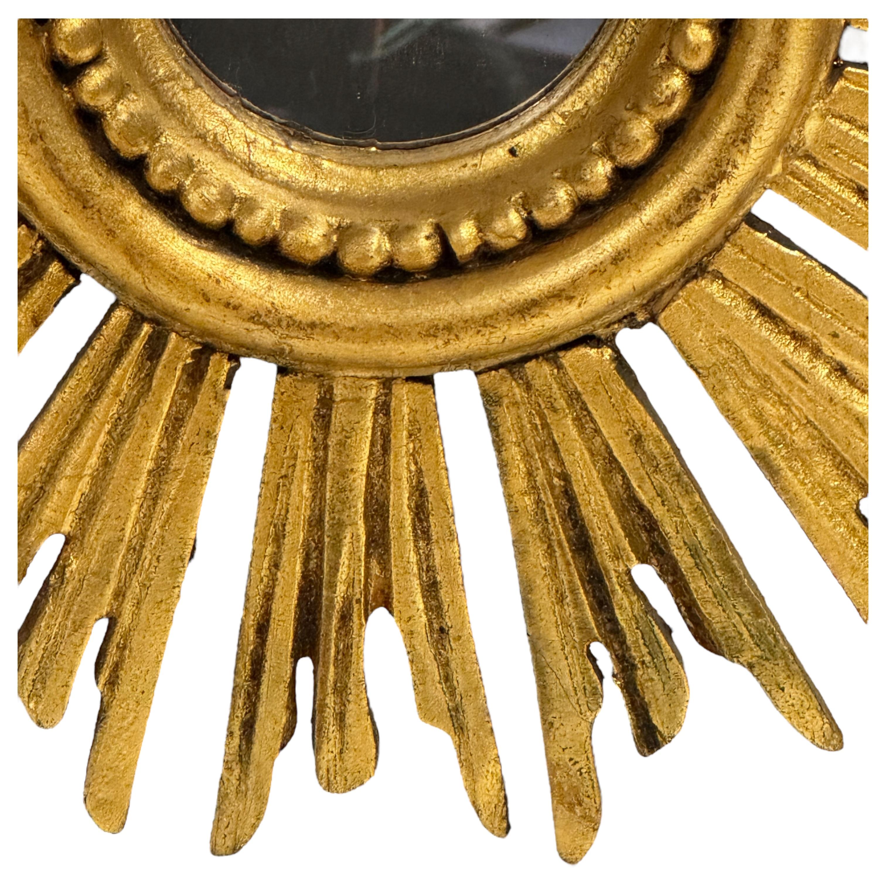 Gilt Beautiful Petite Starburst Sunburst Gilded Wood Mirror, Germany circa 1950s