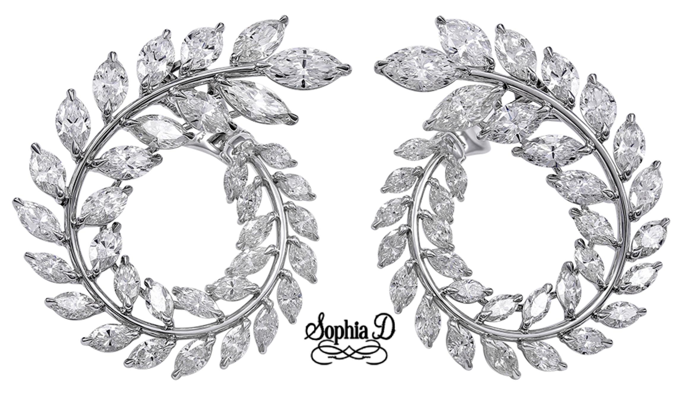 Beautiful platinum earrings with 18.60 carat marquise cut diamonds.