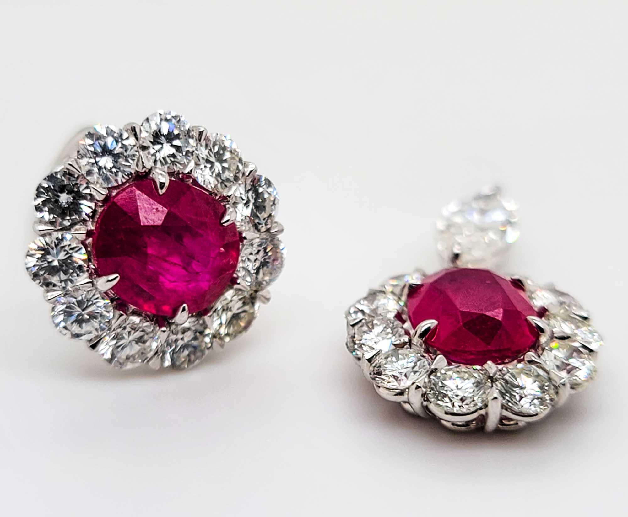 Beautifully designed platinum earrings by Sophia D that features round rubies with total weight of 8.77 carats and together with marquise diamonds in between and surrounding round diamonds with total weight 6.79 carats detachable earrings.

Sophia D