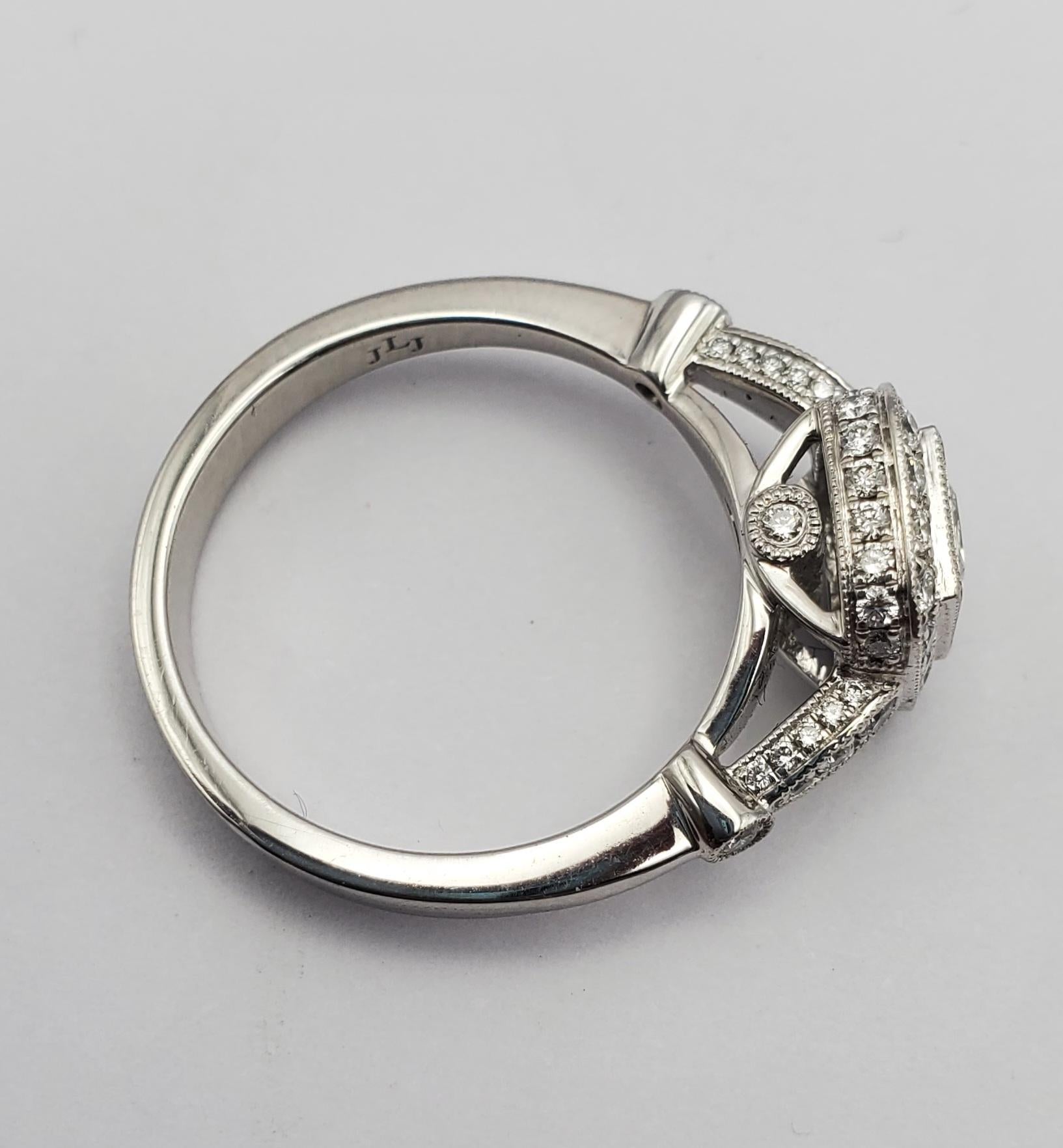 Contemporary Beautiful Platinum Princess Cut Center Halo Engagement Ring For Sale