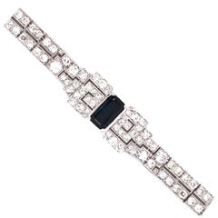 Schönes Schleifenarmband aus Platin mit Saphir und Diamant