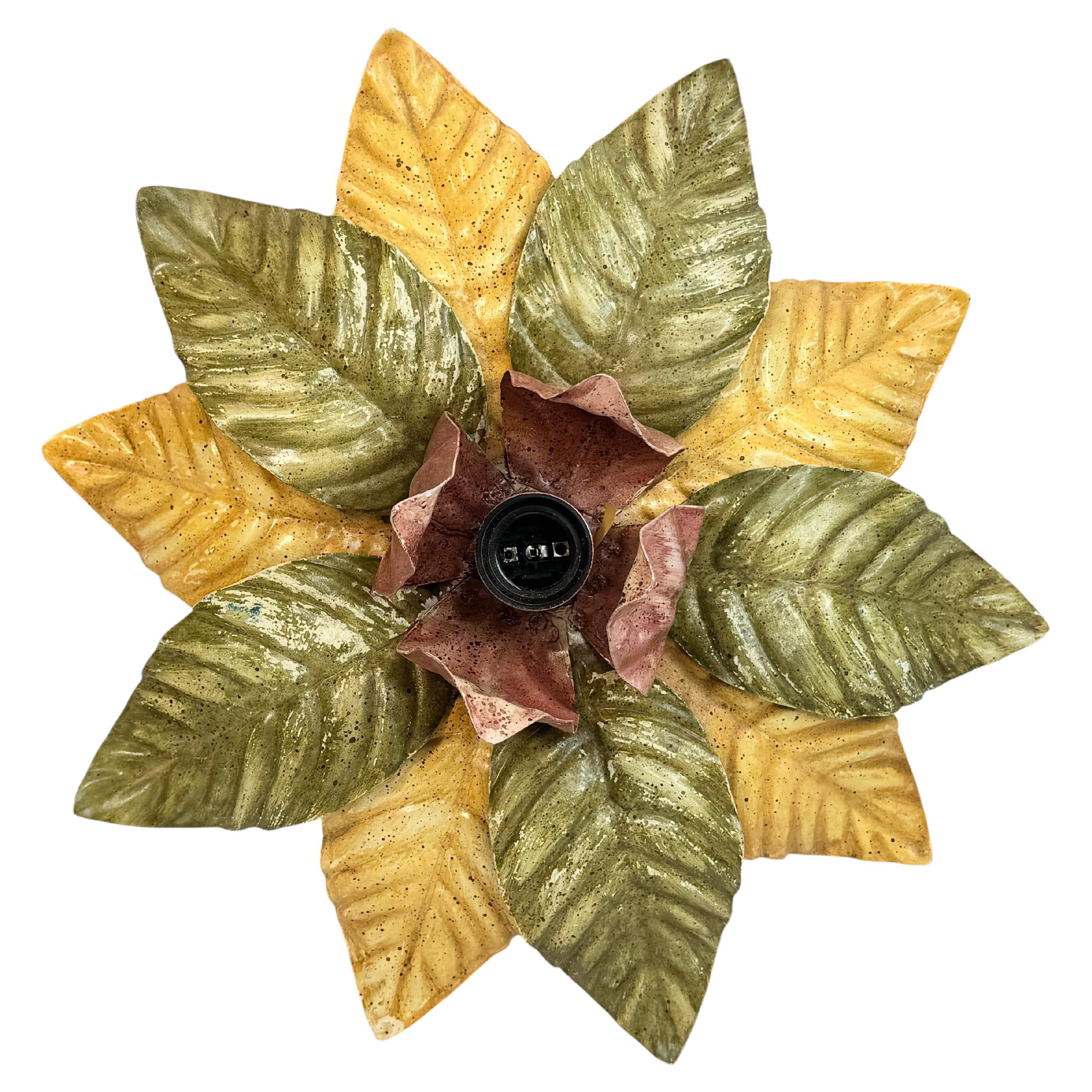 Florentine Style Flush Mount Ceiling Light, Italy, 1960s

Add a touch of understated opulence to your home with this charming Florentine-style flush mount light. Discovered at an estate sale in Parma, Italy, this elegant fixture embodies the refined