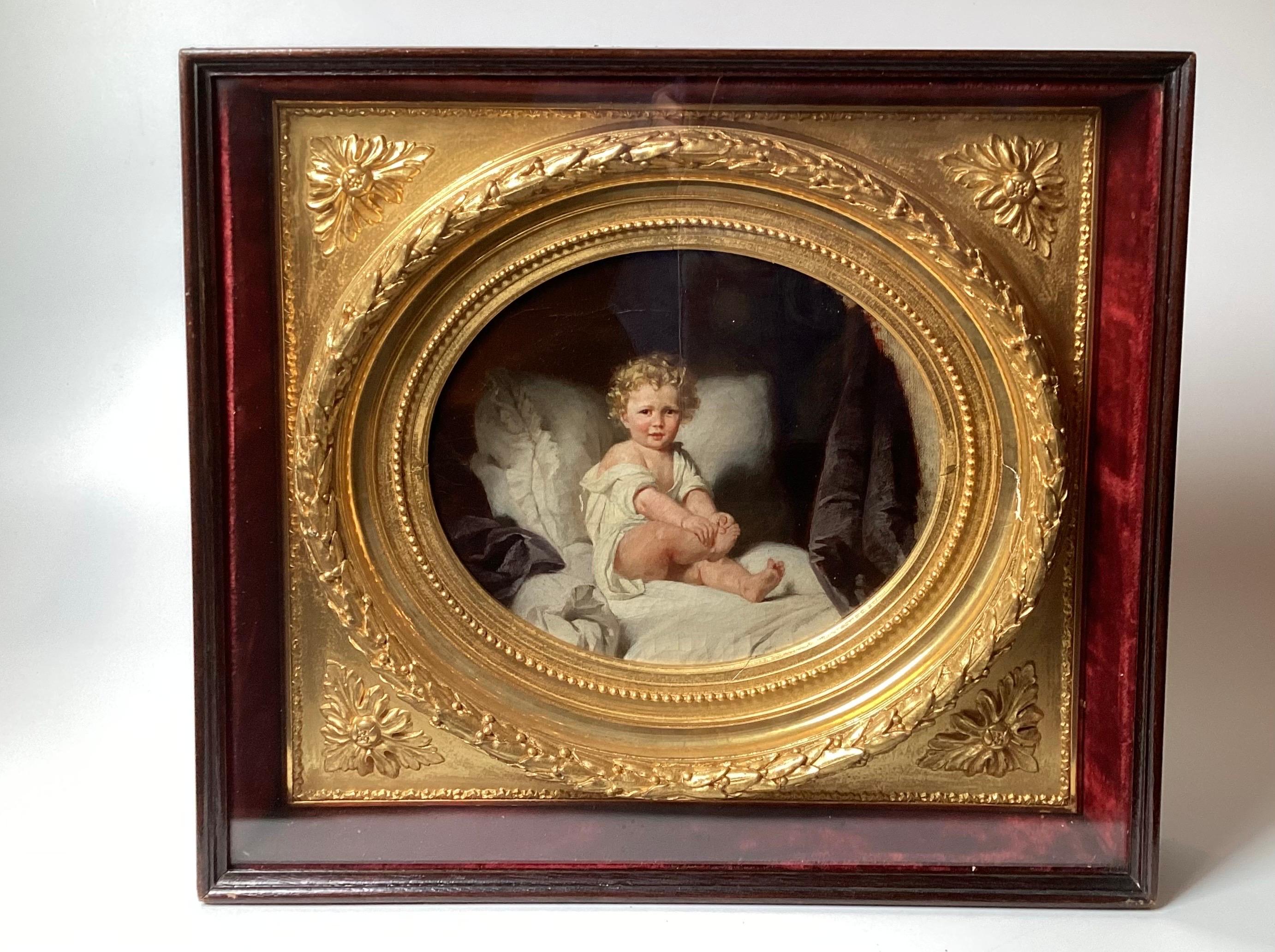 A beautiful portrait of a young boy exquisitely painted oil on canvas, German, attributed to artist August Sohn (1830-1889).  The height quality gilt wood frame in shadow box museum style frame under glass.  The boy with golden curly locks, sitting