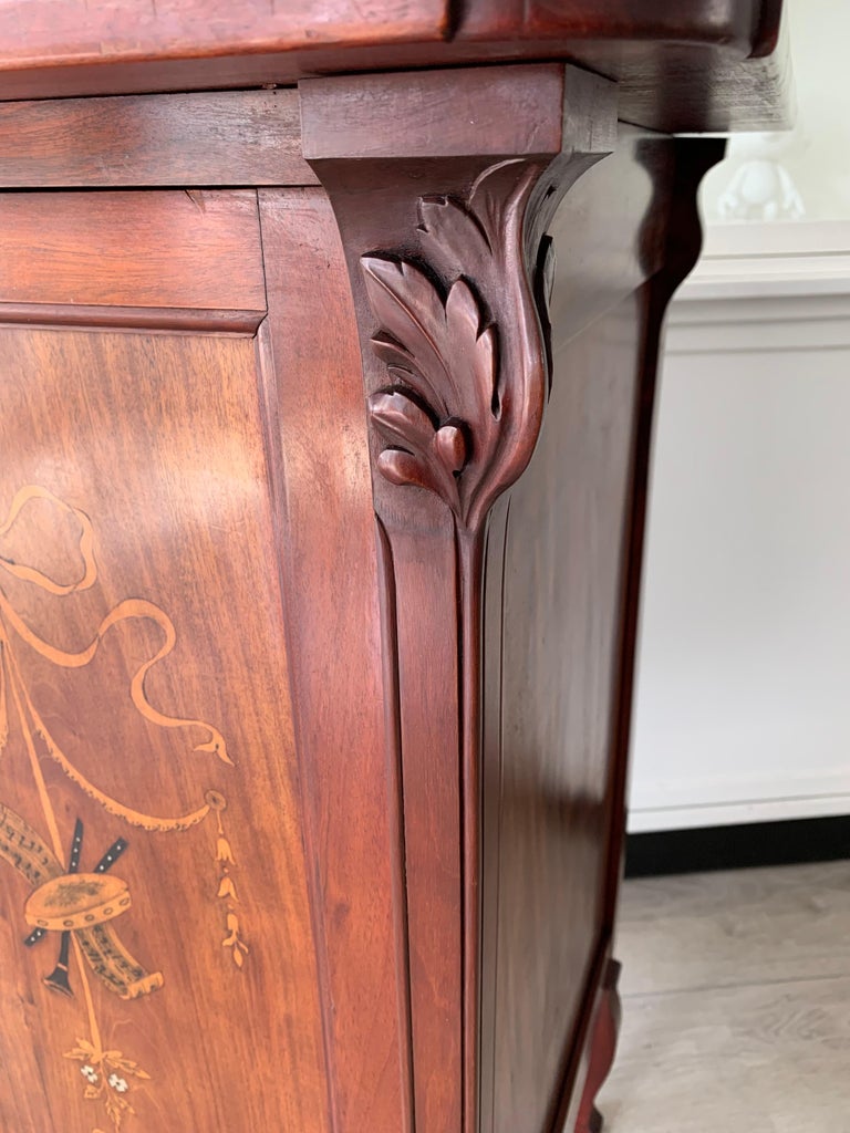 Beautiful and Practical Art Nouveau Style with Inlaid Door and