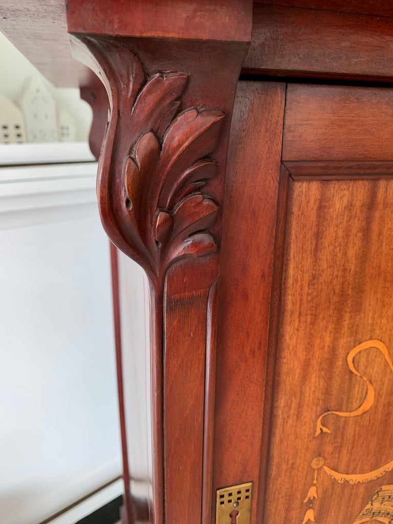 Beautiful and Practical Art Nouveau Style with Inlaid Door and