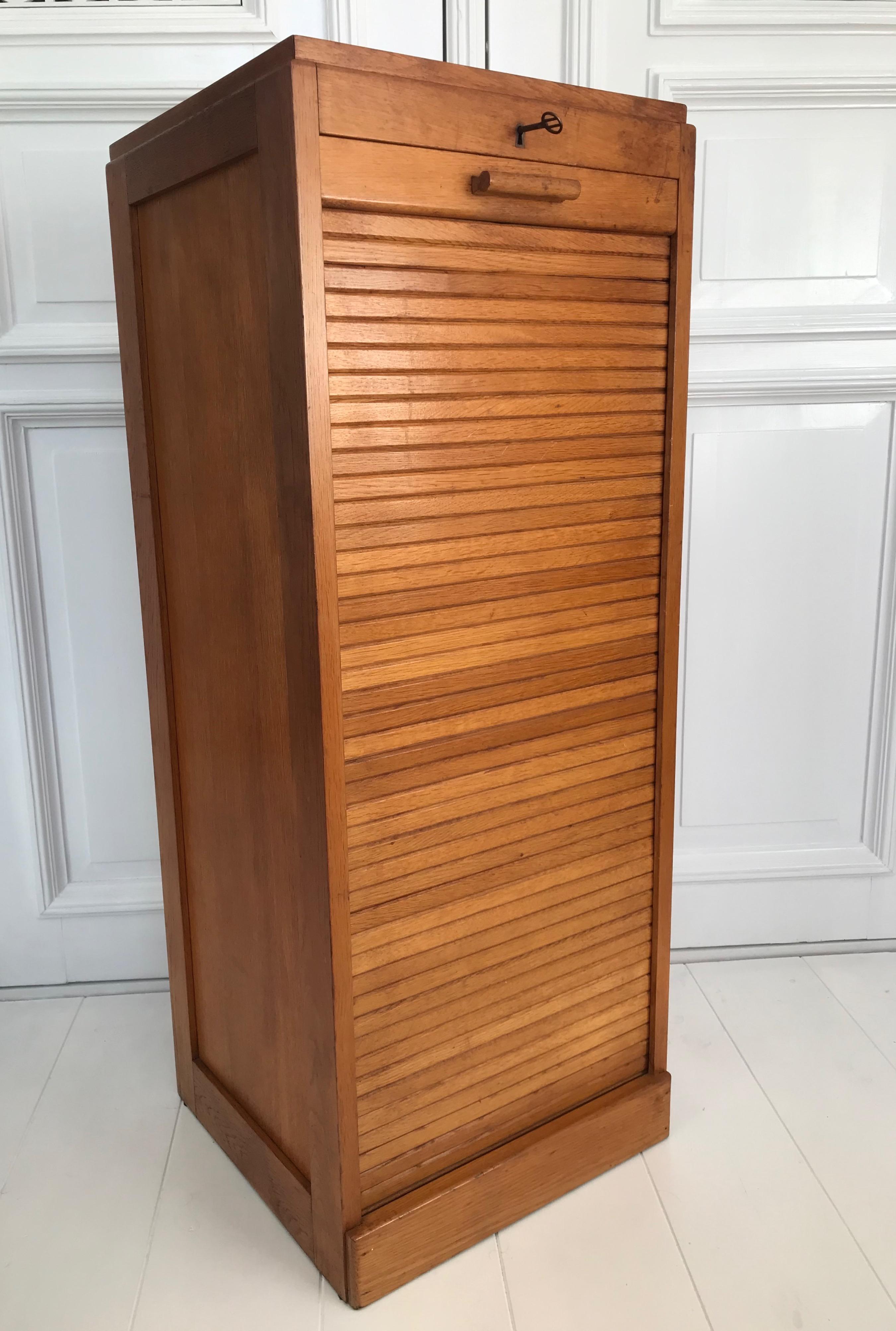 Marvelous condition, Art Deco era filing cabinet, circa 1920.

This Dutch filing cabinet is a Fine example of the quality furniture that was made in those days. The angular design and the warm & wonderful honey color patina are an absolute joy to