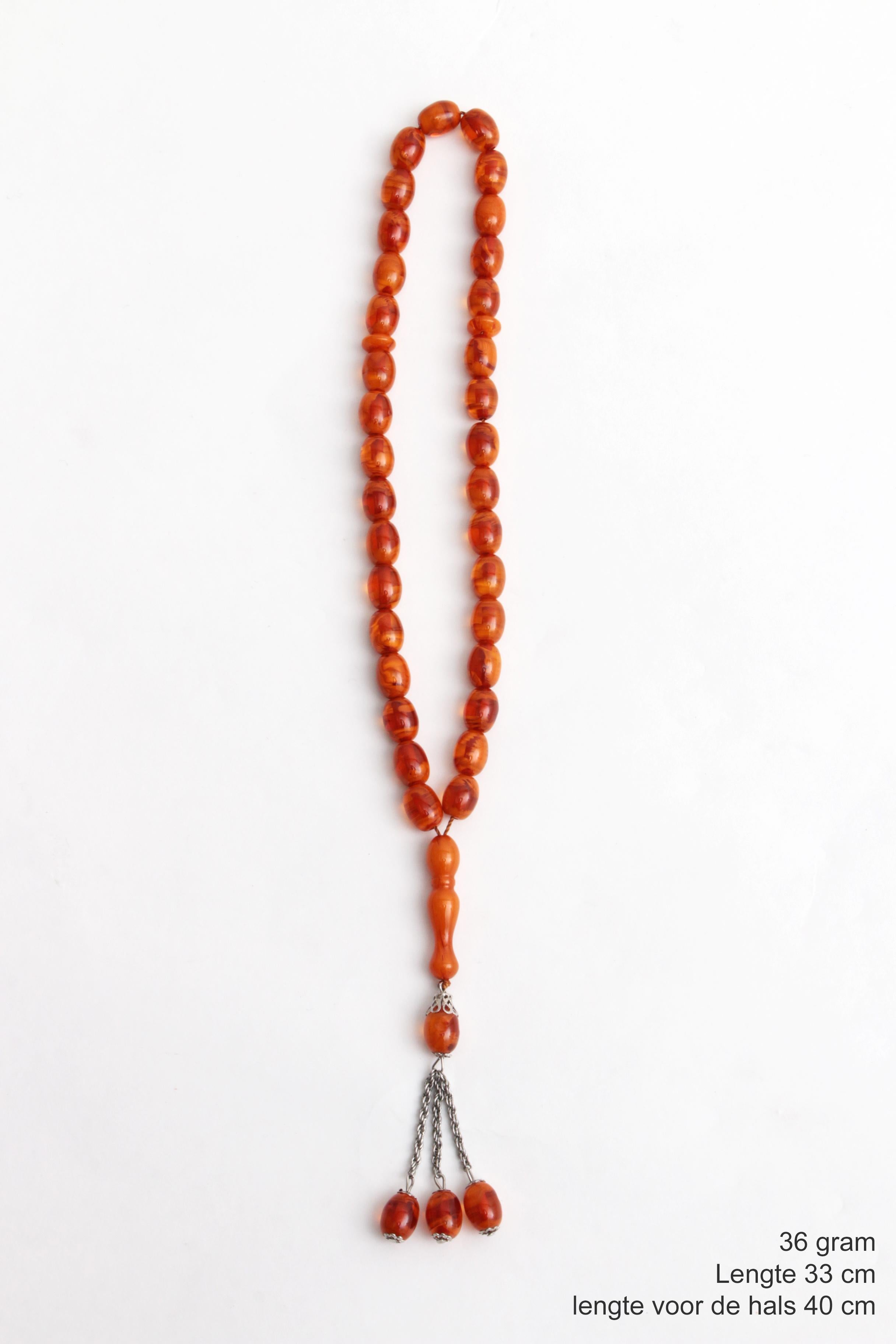 European Beautiful Prayer Necklace Made of Amber from the 1960s For Sale