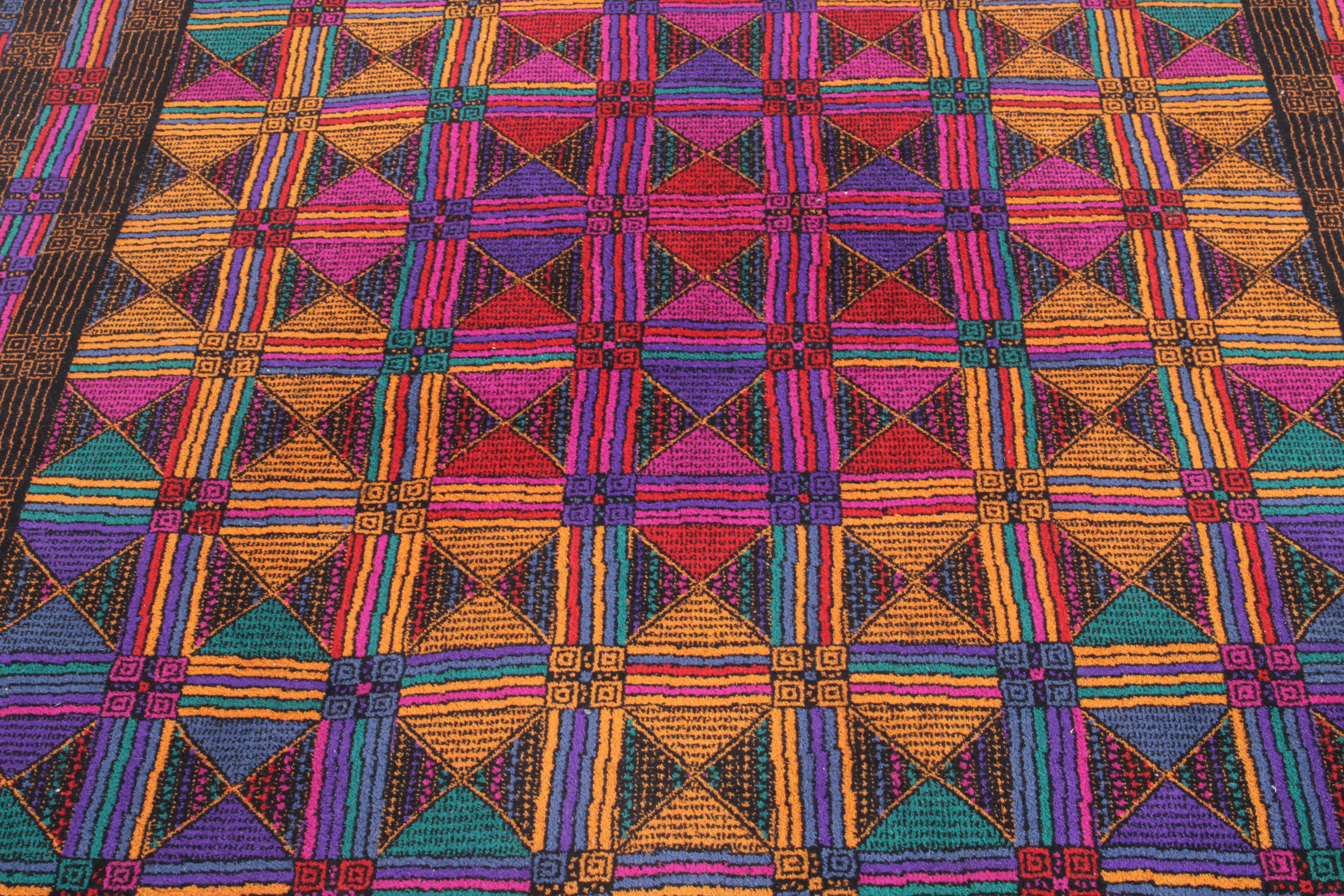 A wonderful vibrant original T & J Vestor designed Missoni rug in pure virgin wool. This outstanding piece with vibrant colours and a stunning geometric pattern is sure to make a real design impact in your home or interior design project. Sourced