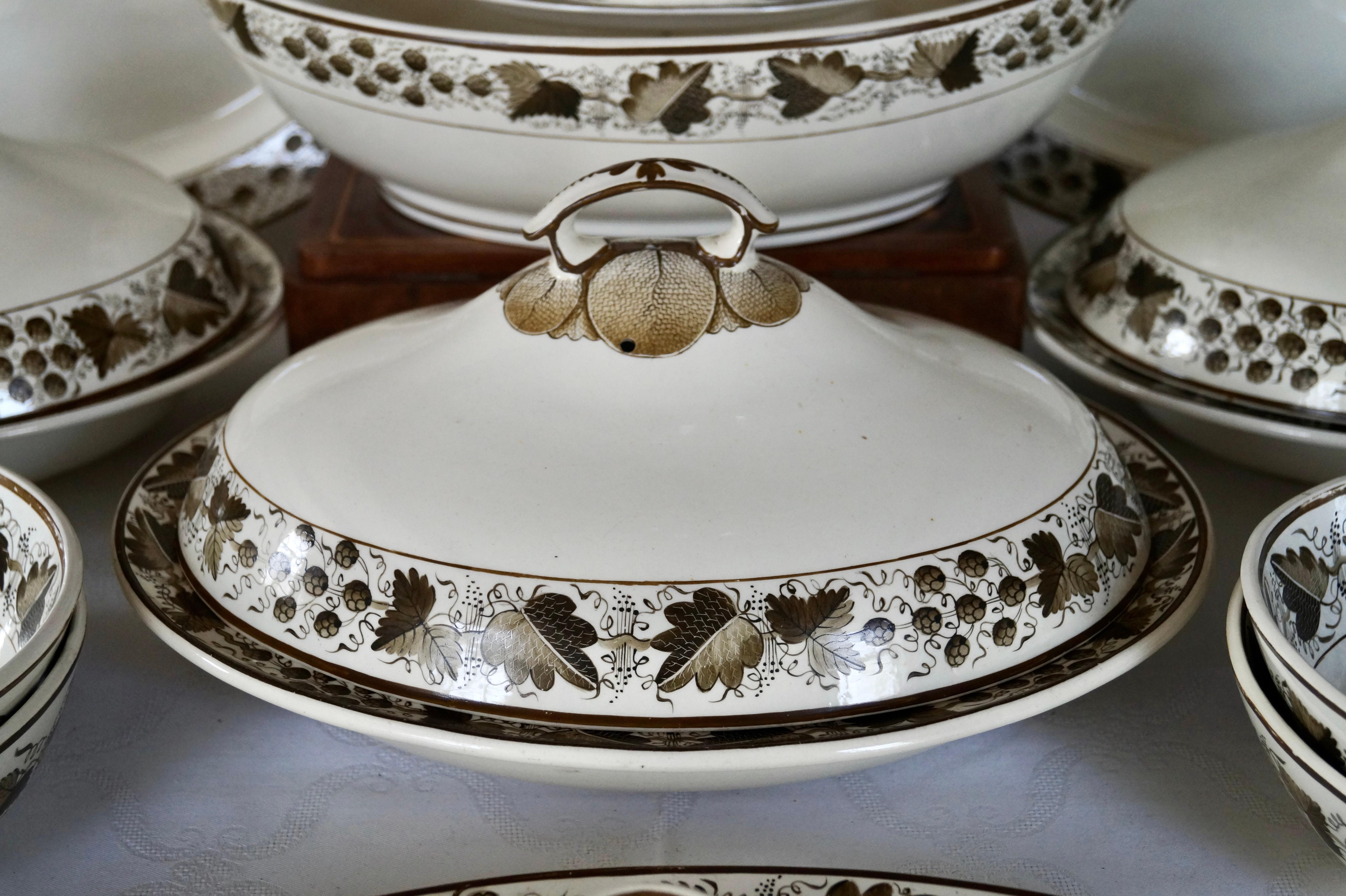 Beautiful rare extensive antique Copeland Spode creamware tableware parts ca 1800s

The border outside and inside are Handpainted decorated with oak leaves and walnut, chestnuts decoration in the color brown. The pattern number is