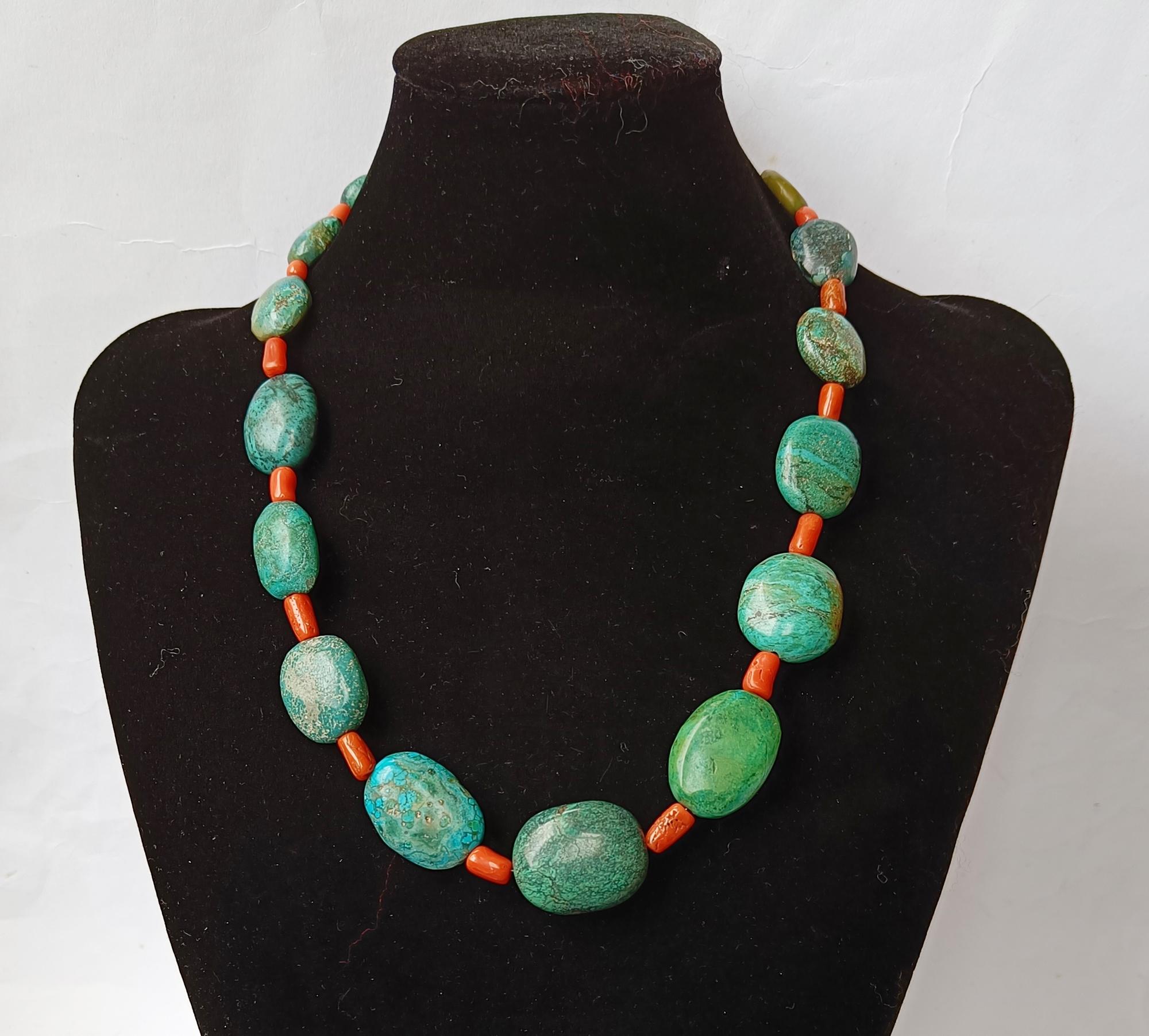 Vintage Ethnic Himalayan Turquoise Coral  Necklace

A beautiful necklace of large Tibetan Turquoise beads
interspersed with natural red coral beads with silver clasp
Period 2nd half 20th century  

 
